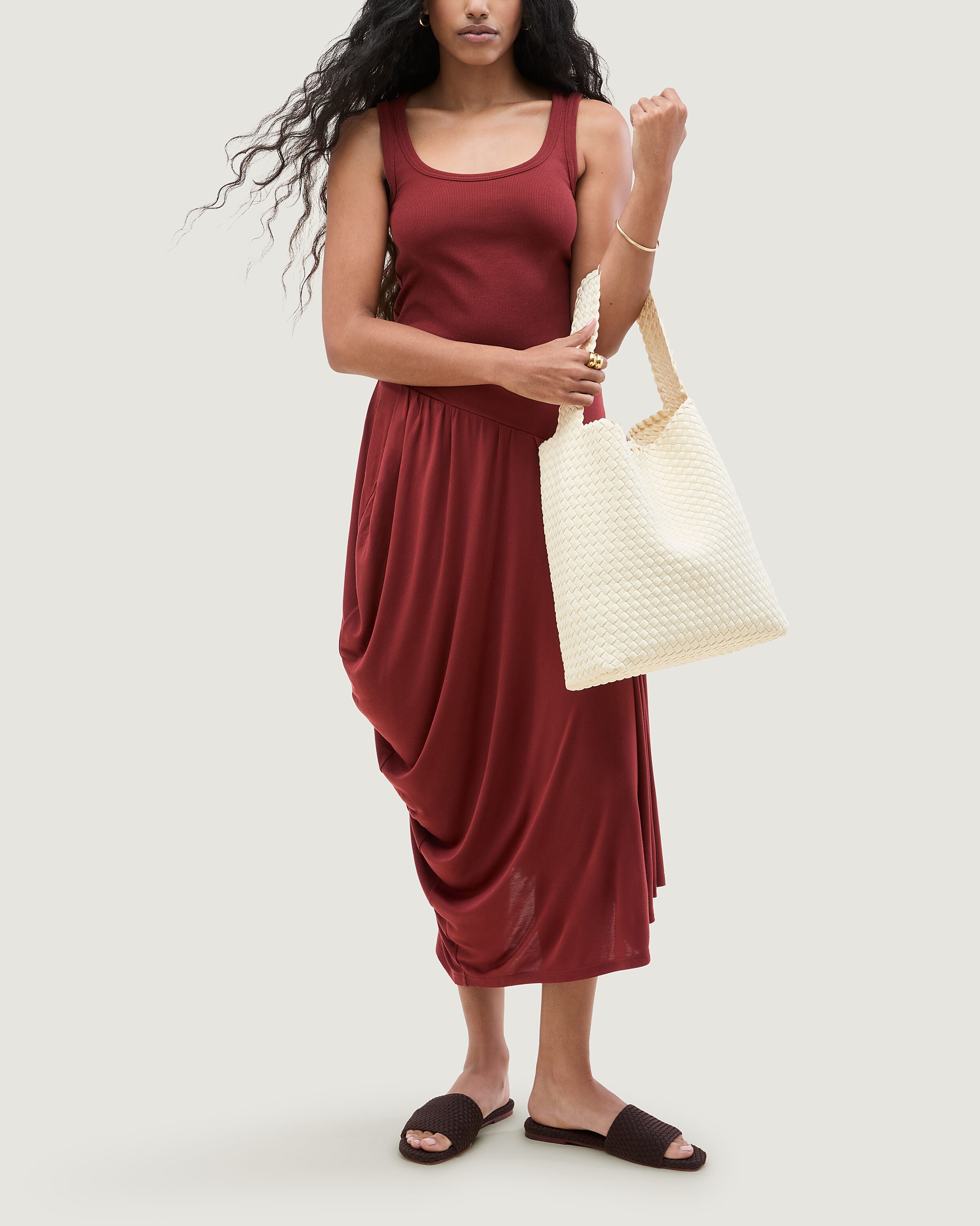 Nomad Hobo in Salt shown on model to illustrate scale and soft silhouette.