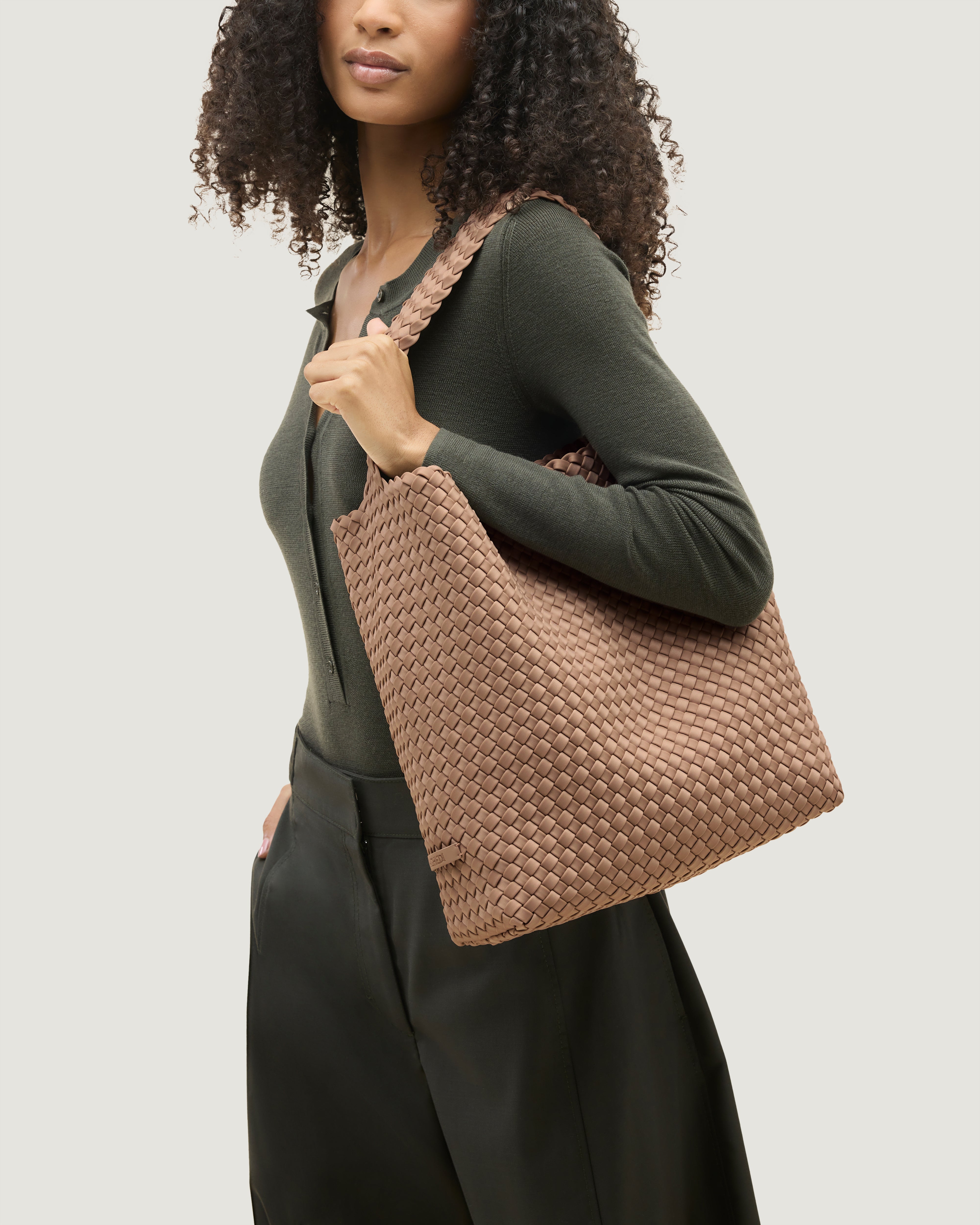 Nomad Hobo in Seychelles shown on model to illustrate scale and soft silhouette.