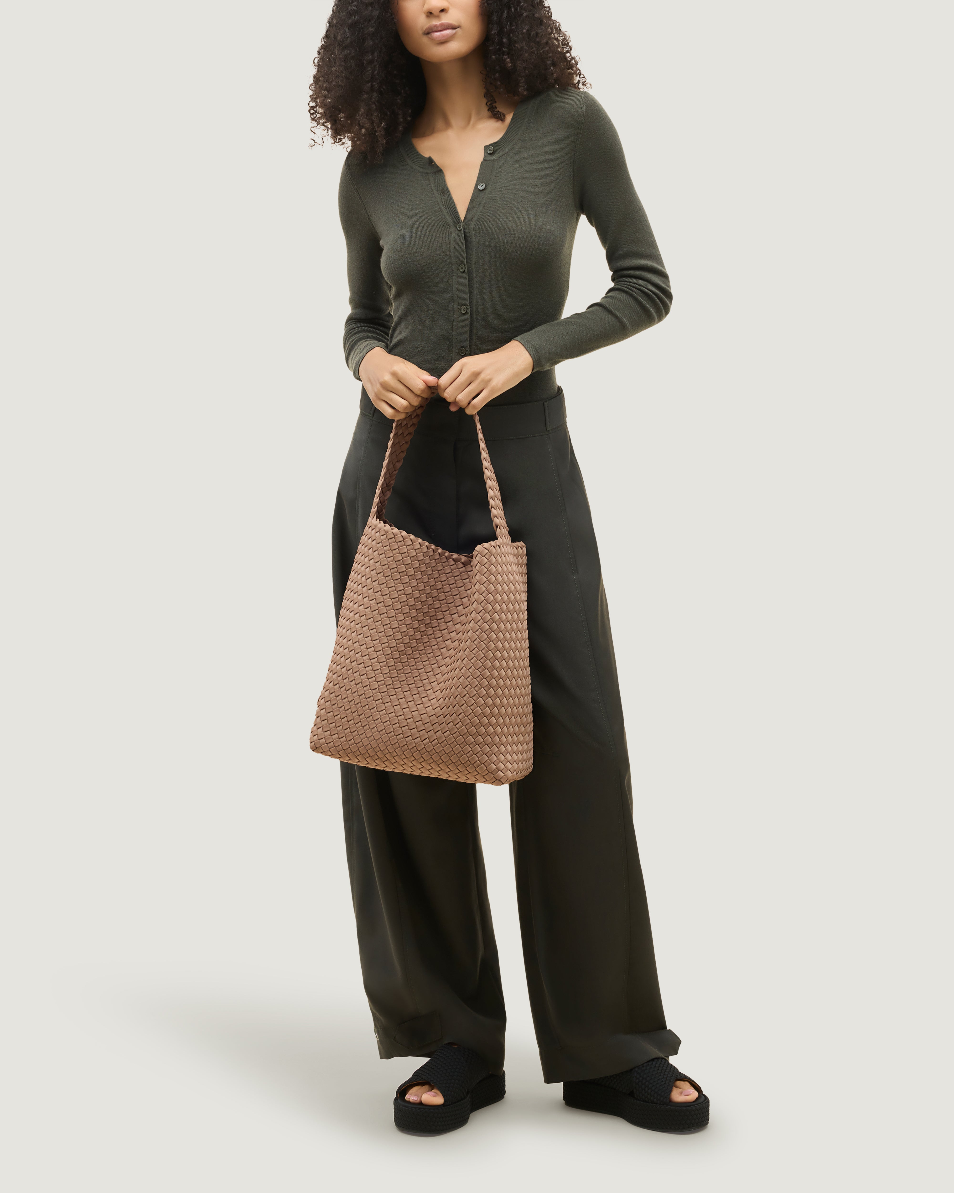 Nomad Hobo in Seychelles shown on model to illustrate scale and soft silhouette.