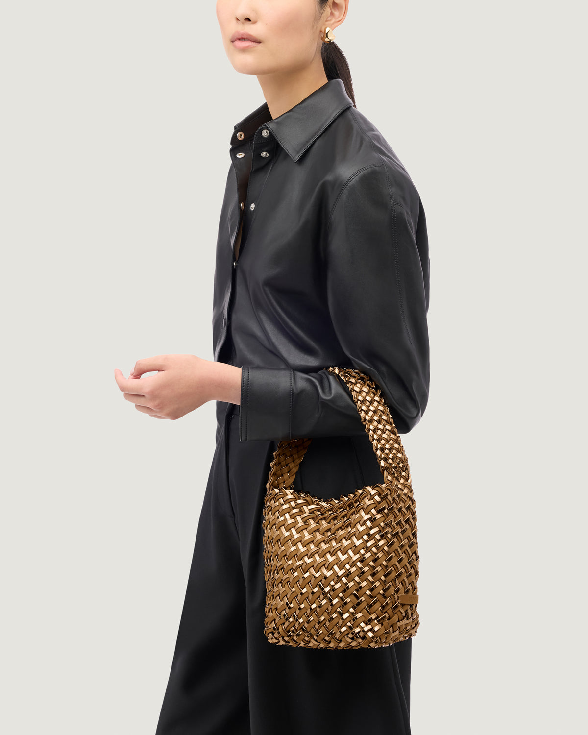 Nomad Small Hobo in Firenze shown on model to illustrate scale and soft silhouette.