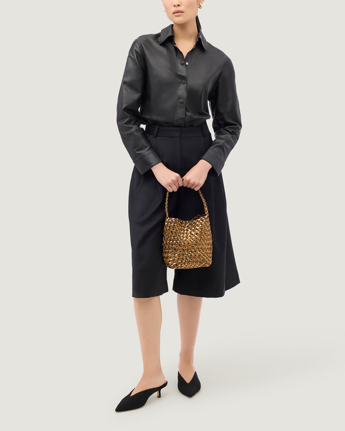 Nomad Small Hobo in Firenze shown on model to illustrate scale and soft silhouette.