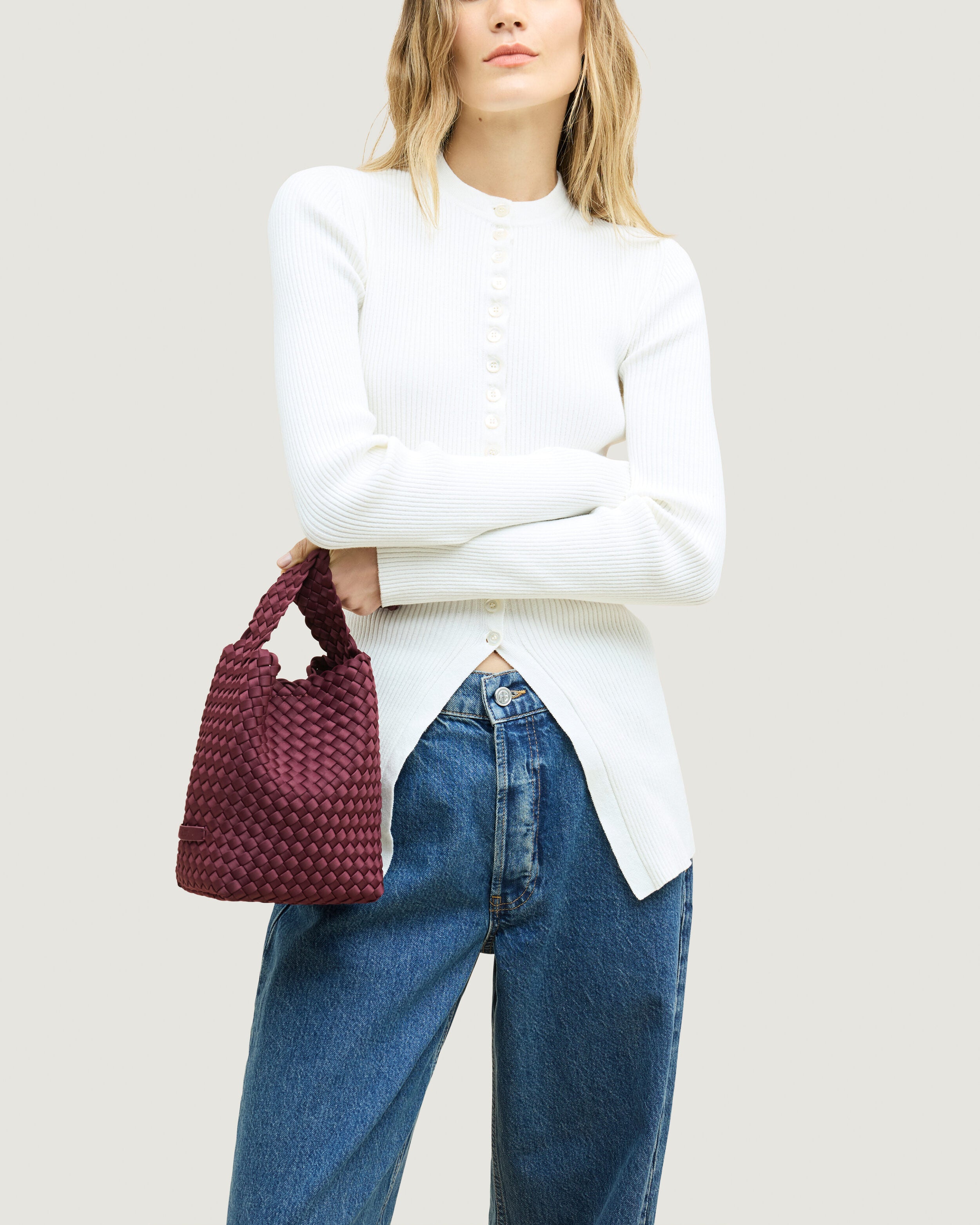 Nomad Hobo in Bordeaux shown on model to illustrate scale and soft silhouette.