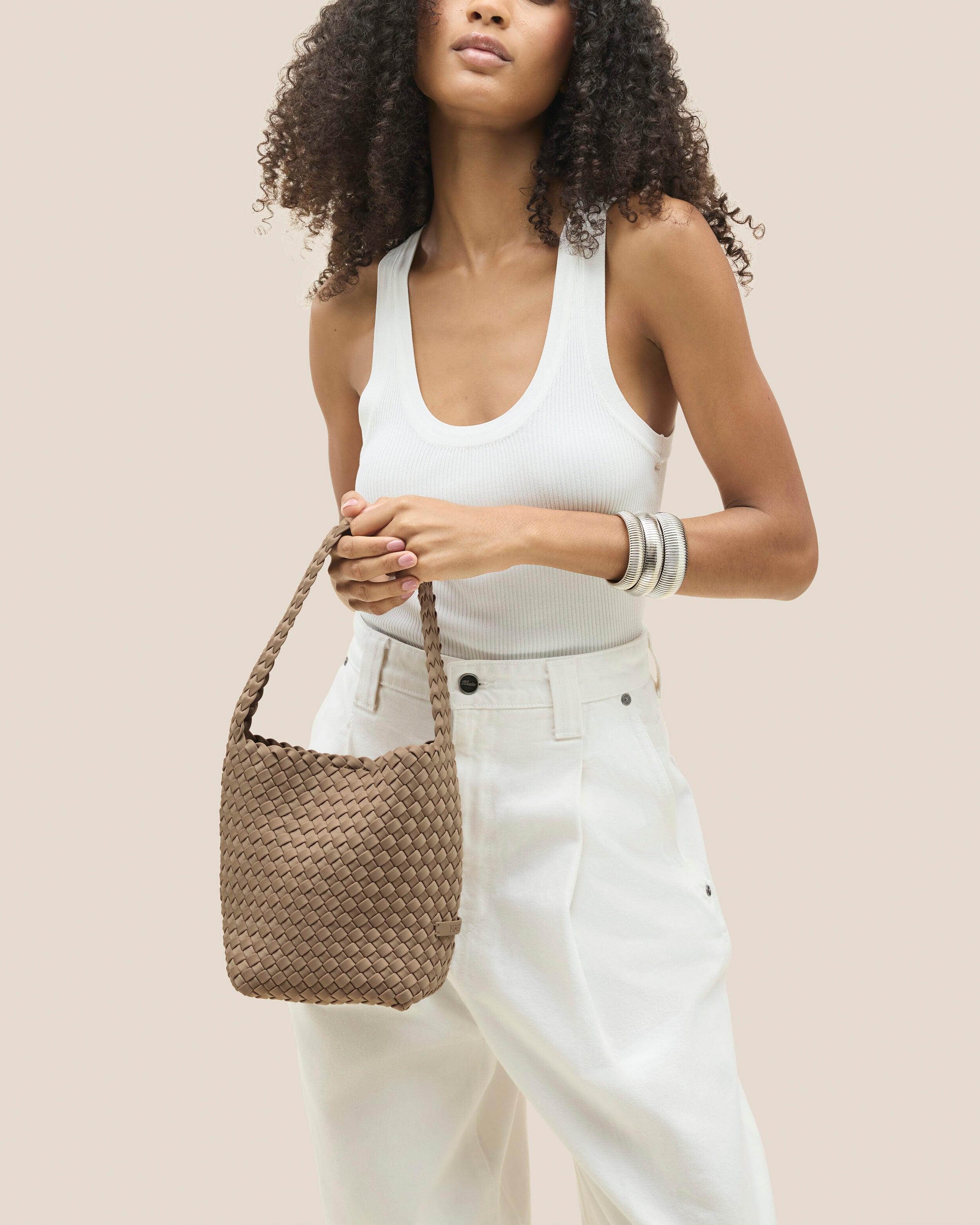 Nomad Hobo in Cashmere shown on model to illustrate scale and soft silhouette.