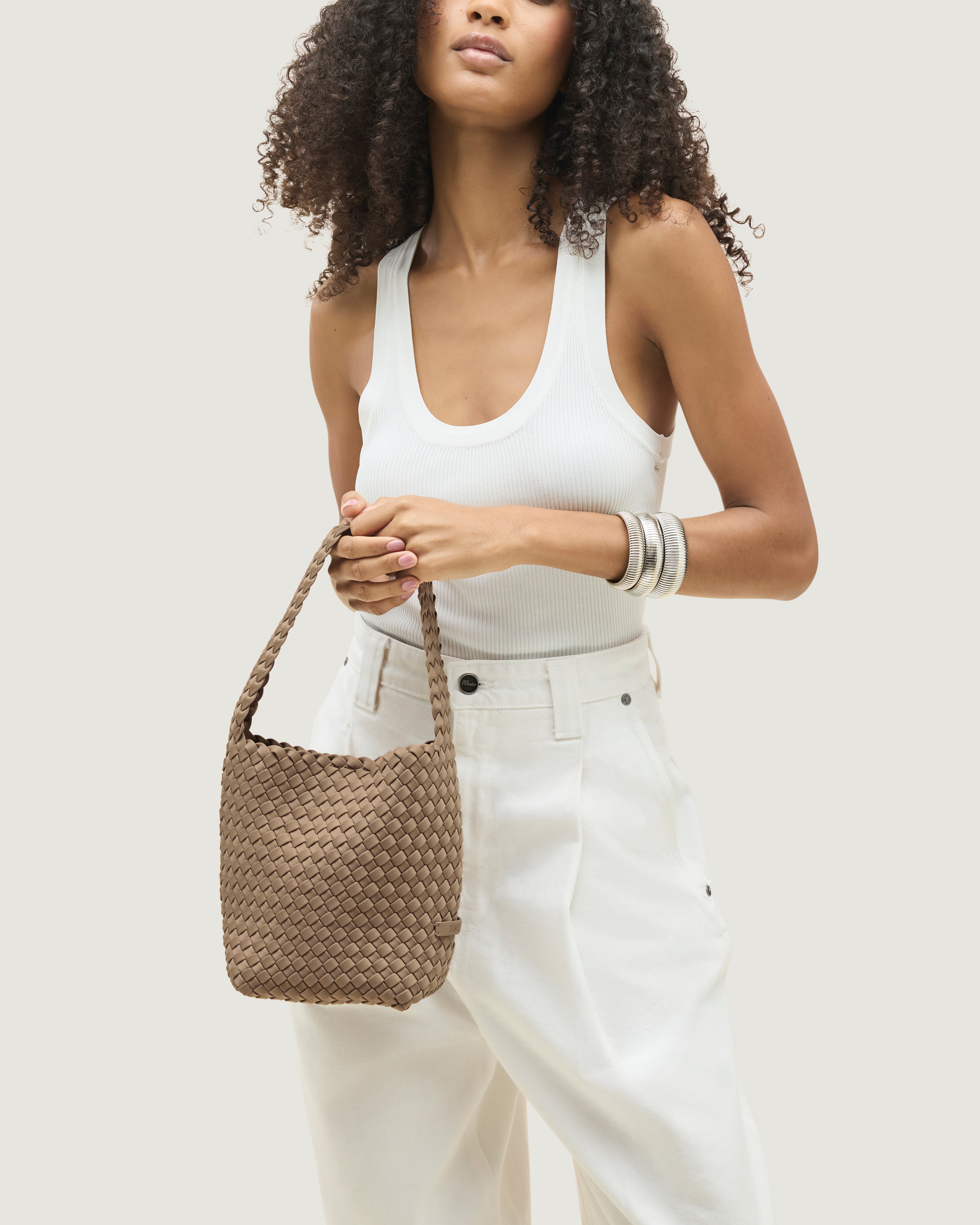 Nomad Hobo in Cashmere shown on model to illustrate scale and soft silhouette.