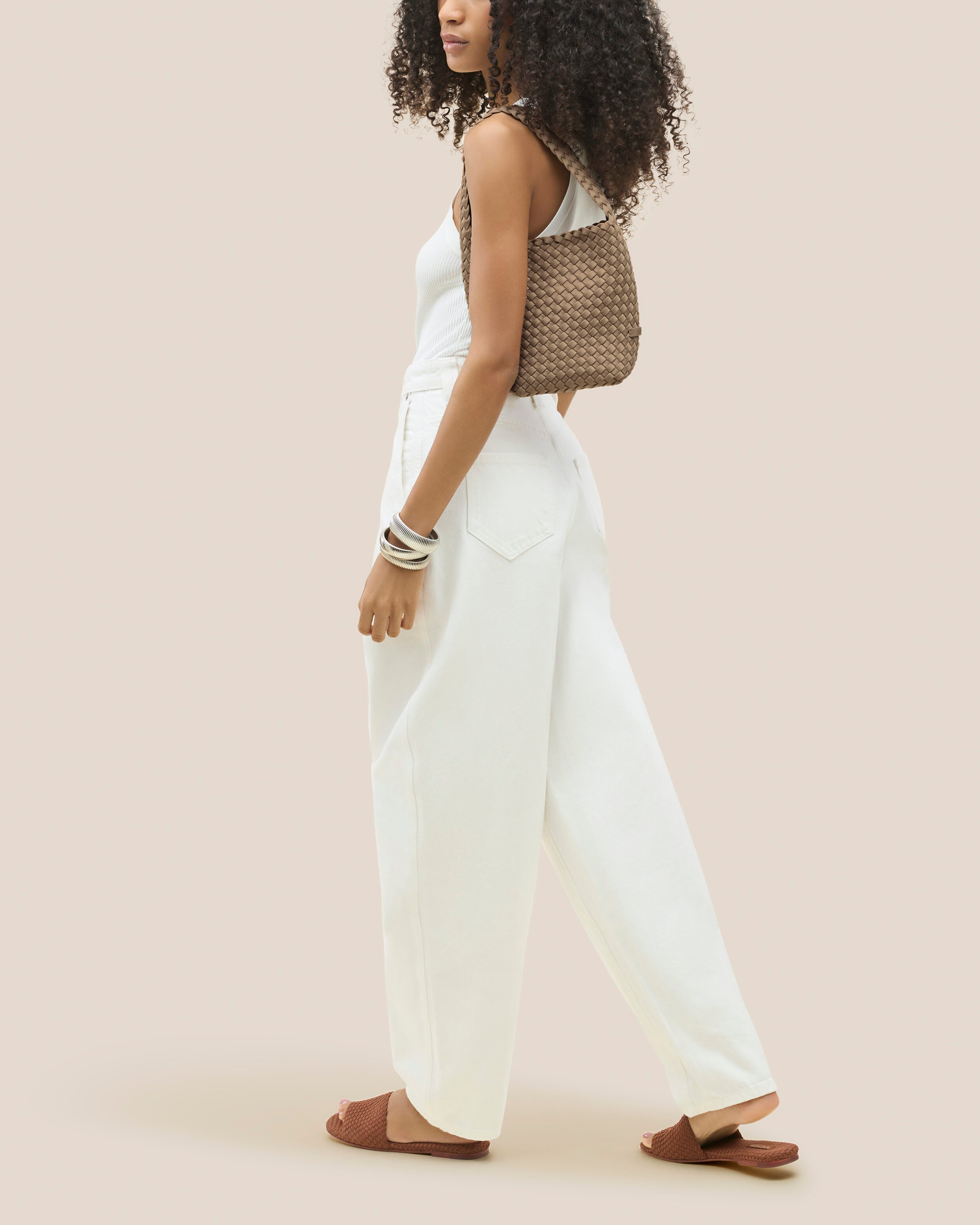 Nomad Hobo in Cashmere shown on model to illustrate scale and soft silhouette.