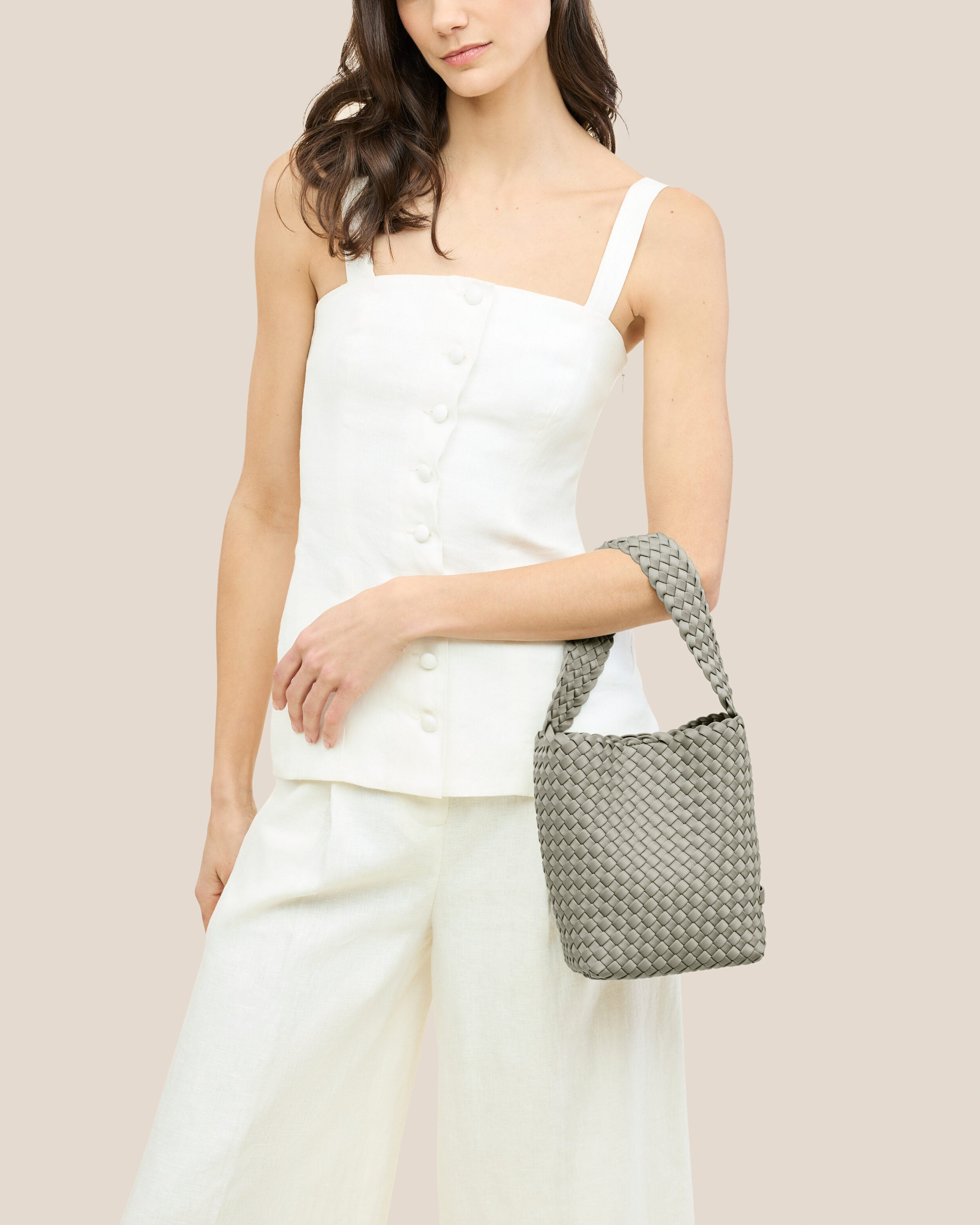 Nomad Hobo in Celadon shown on model to illustrate scale and soft silhouette.