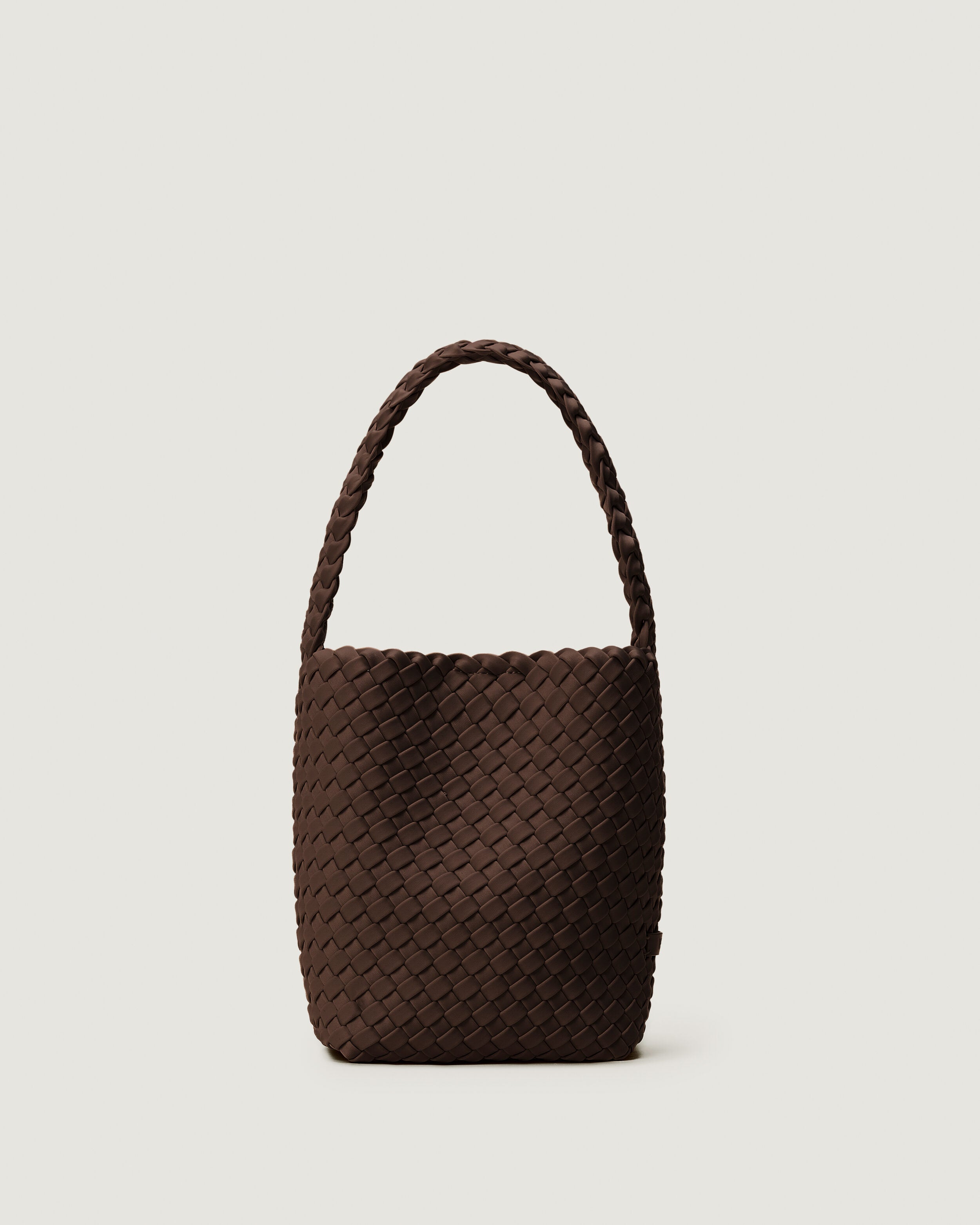 Nomad Hobo in Chocolate, a dark chocolate brown tone, in handwoven neoprene, featuring an open top with magnetic snap closure, and handwoven shoulder strap lays comfortably flat.