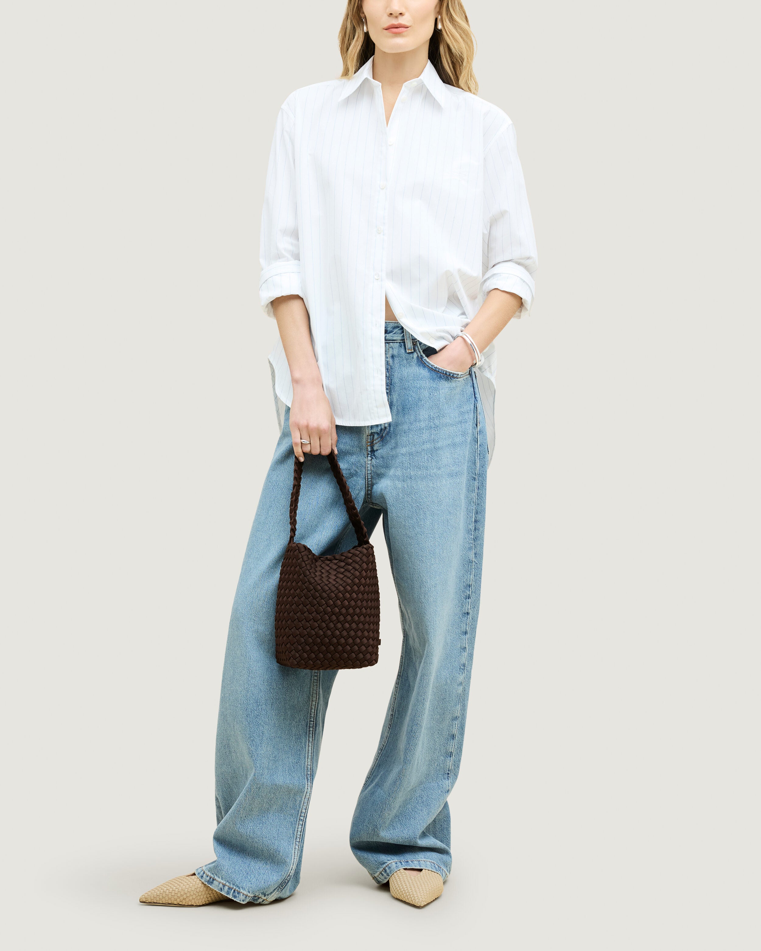 Nomad Hobo in Chocolate shown on model to illustrate scale and soft silhouette.