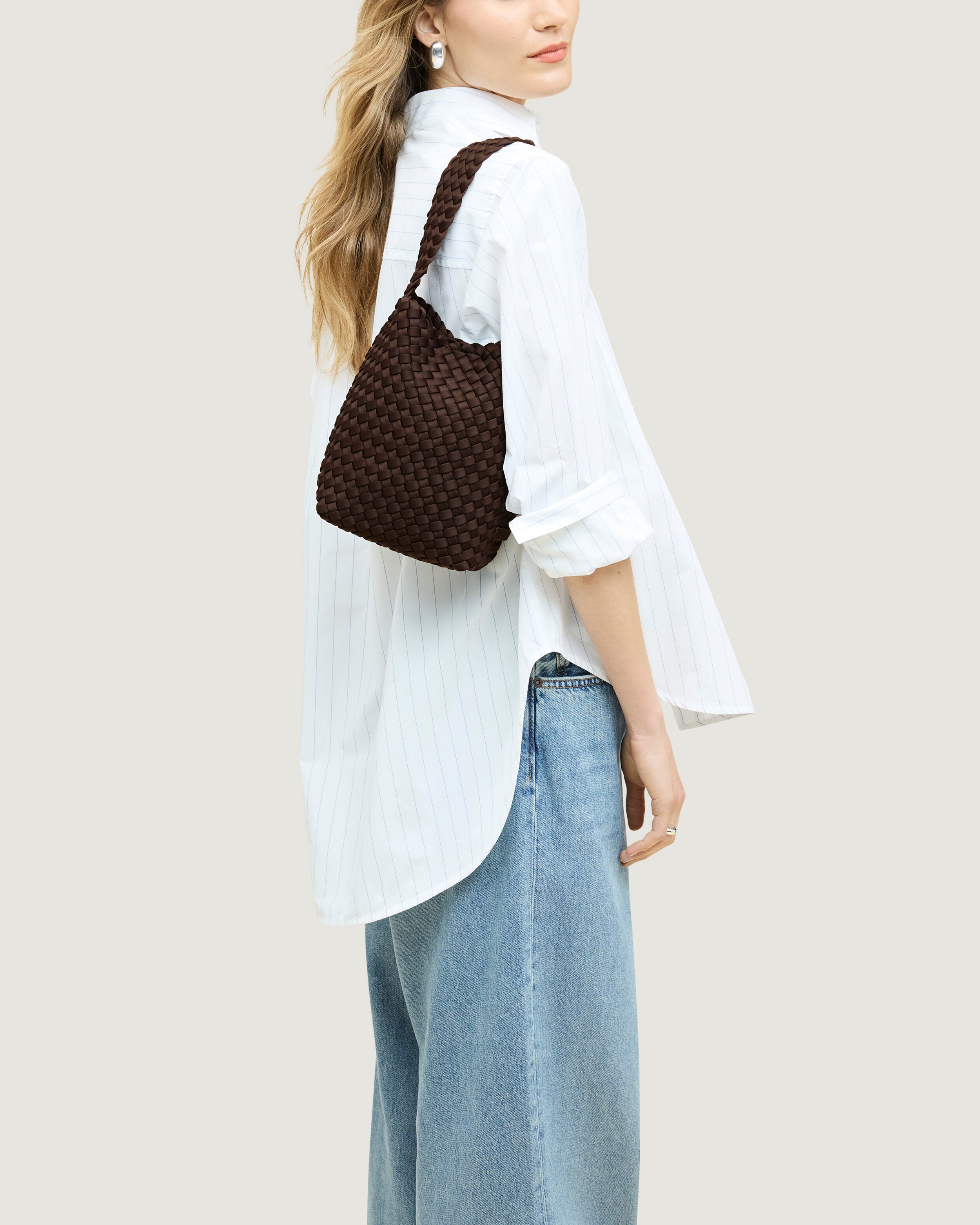 Nomad Hobo in Chocolate shown on model to illustrate scale and soft silhouette.