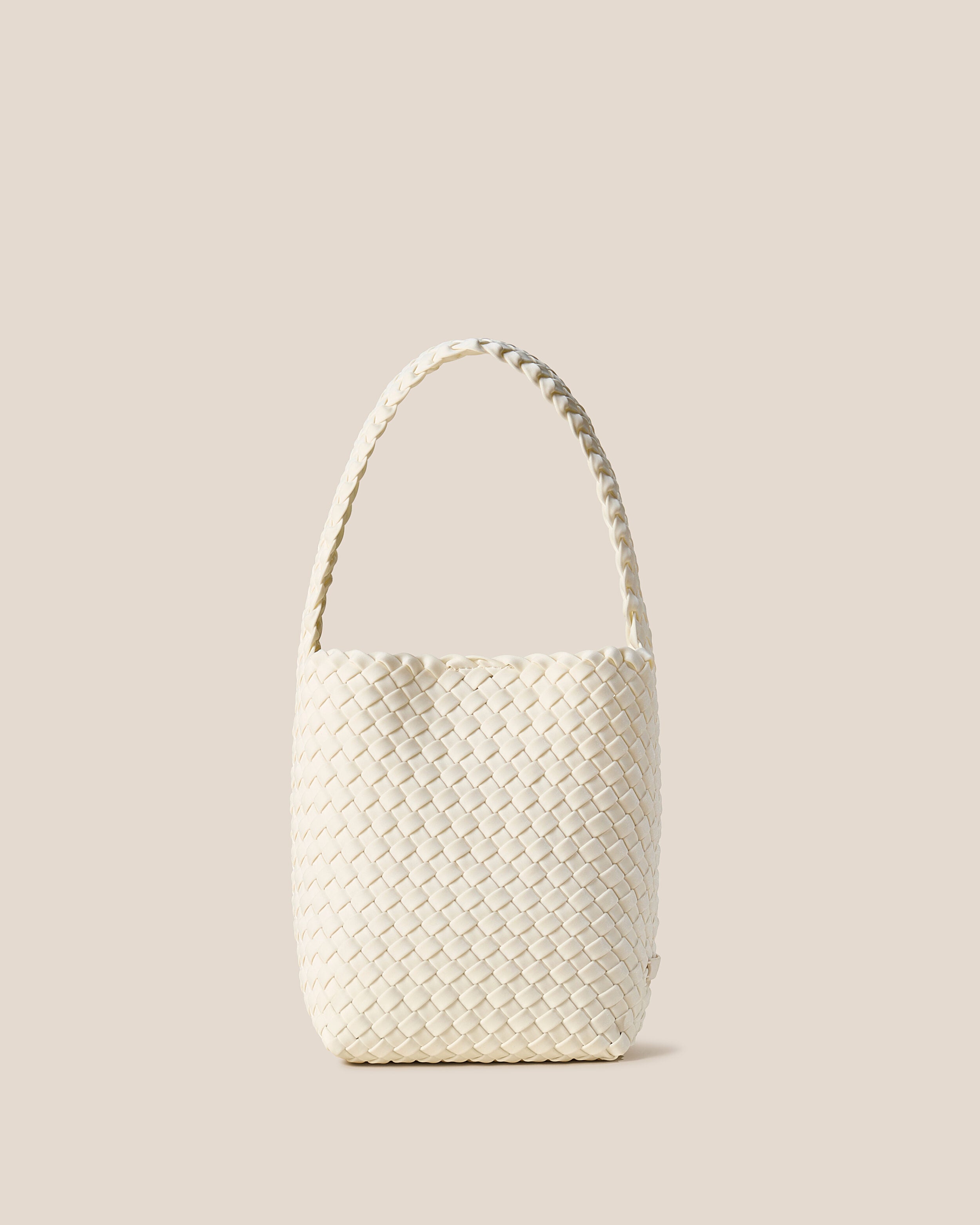 Nomad Hobo in Jasmine, an ivory tone, in handwoven neoprene, featuring an open top with magnetic snap closure, and handwoven shoulder strap lays comfortably flat.