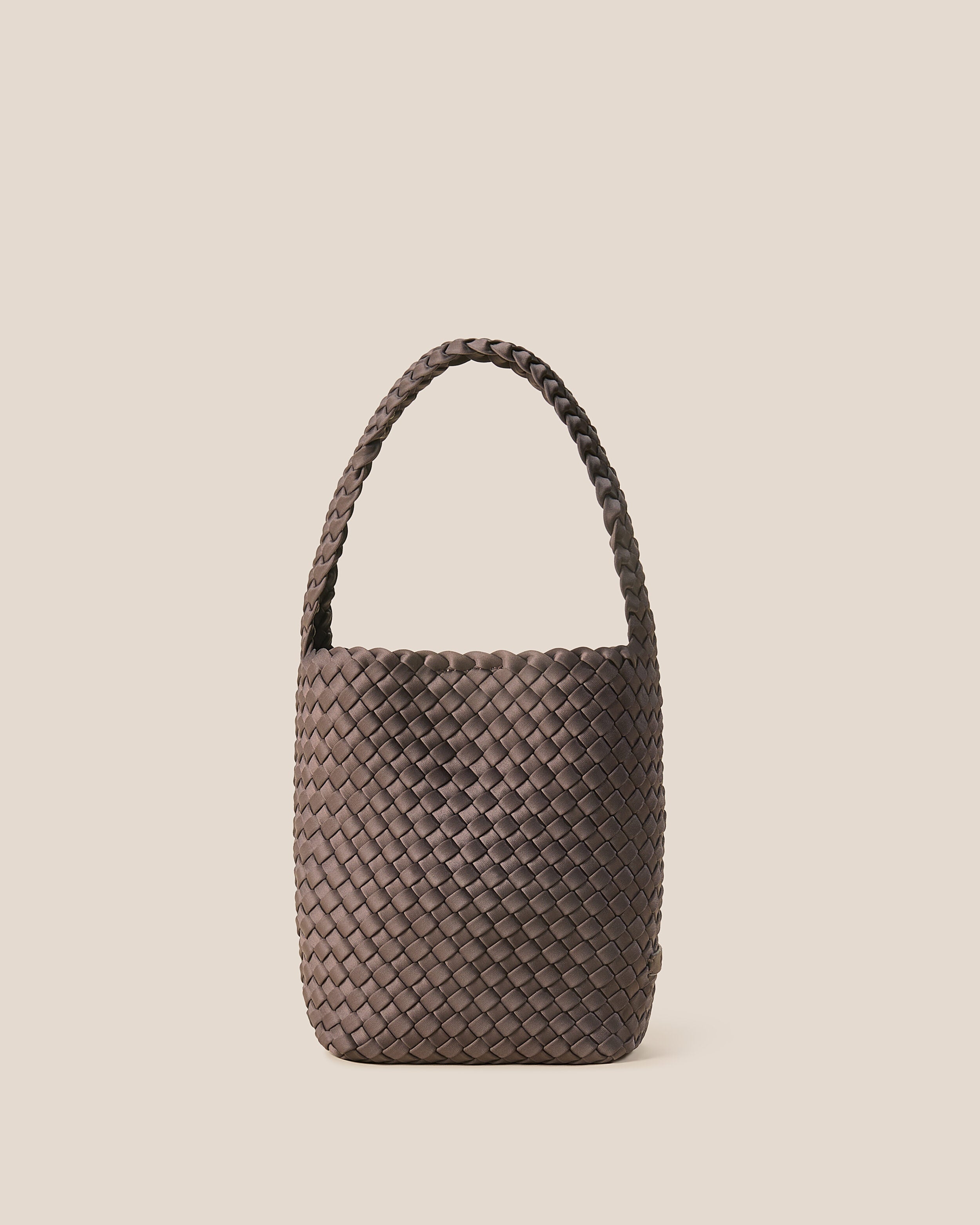 Nomad Hobo in Napa, a dark brown tone, in handwoven neoprene, featuring an open top with magnetic snap closure, and handwoven shoulder strap lays comfortably flat.