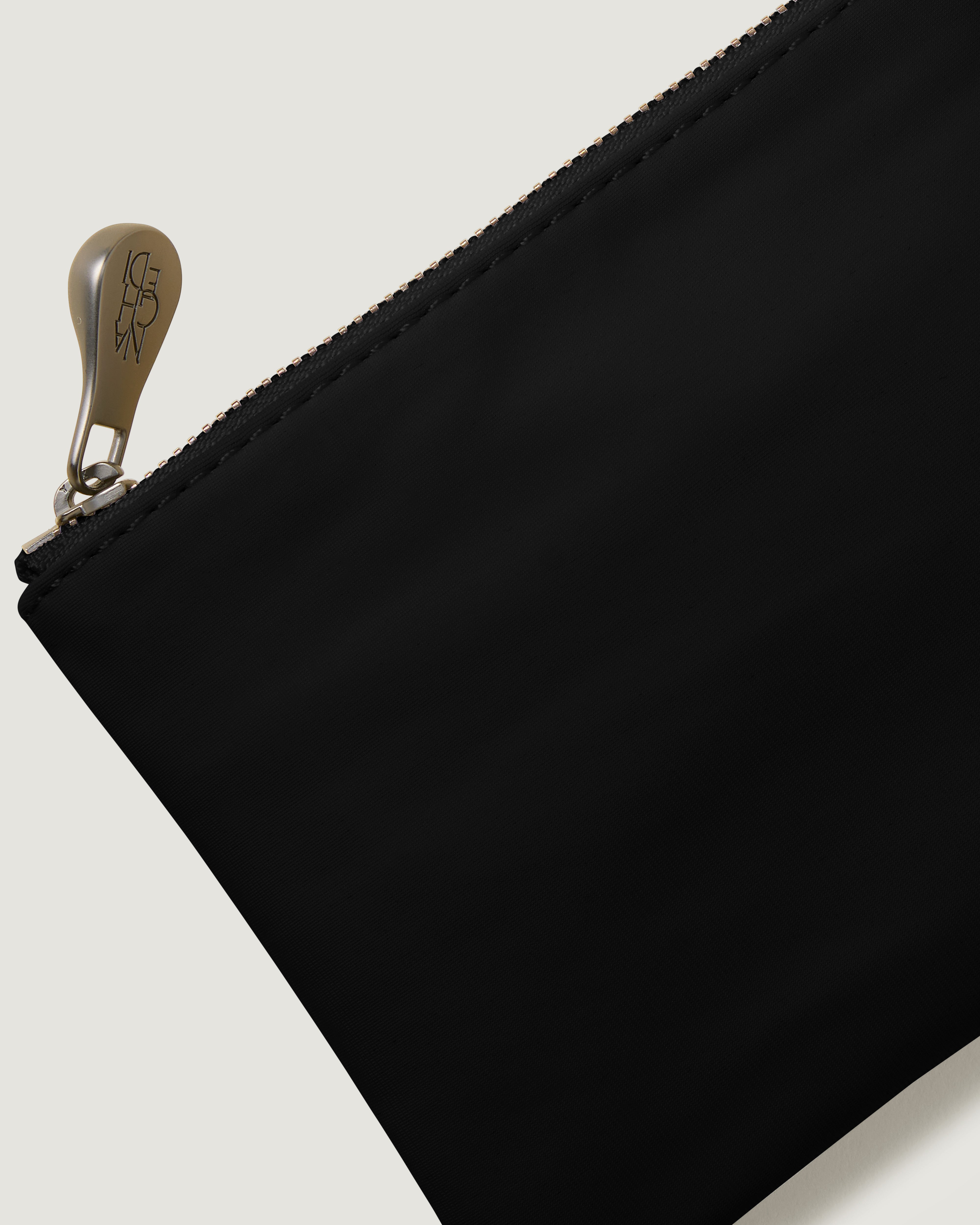 Close-up of included coordinating neoprene zippered pouch.