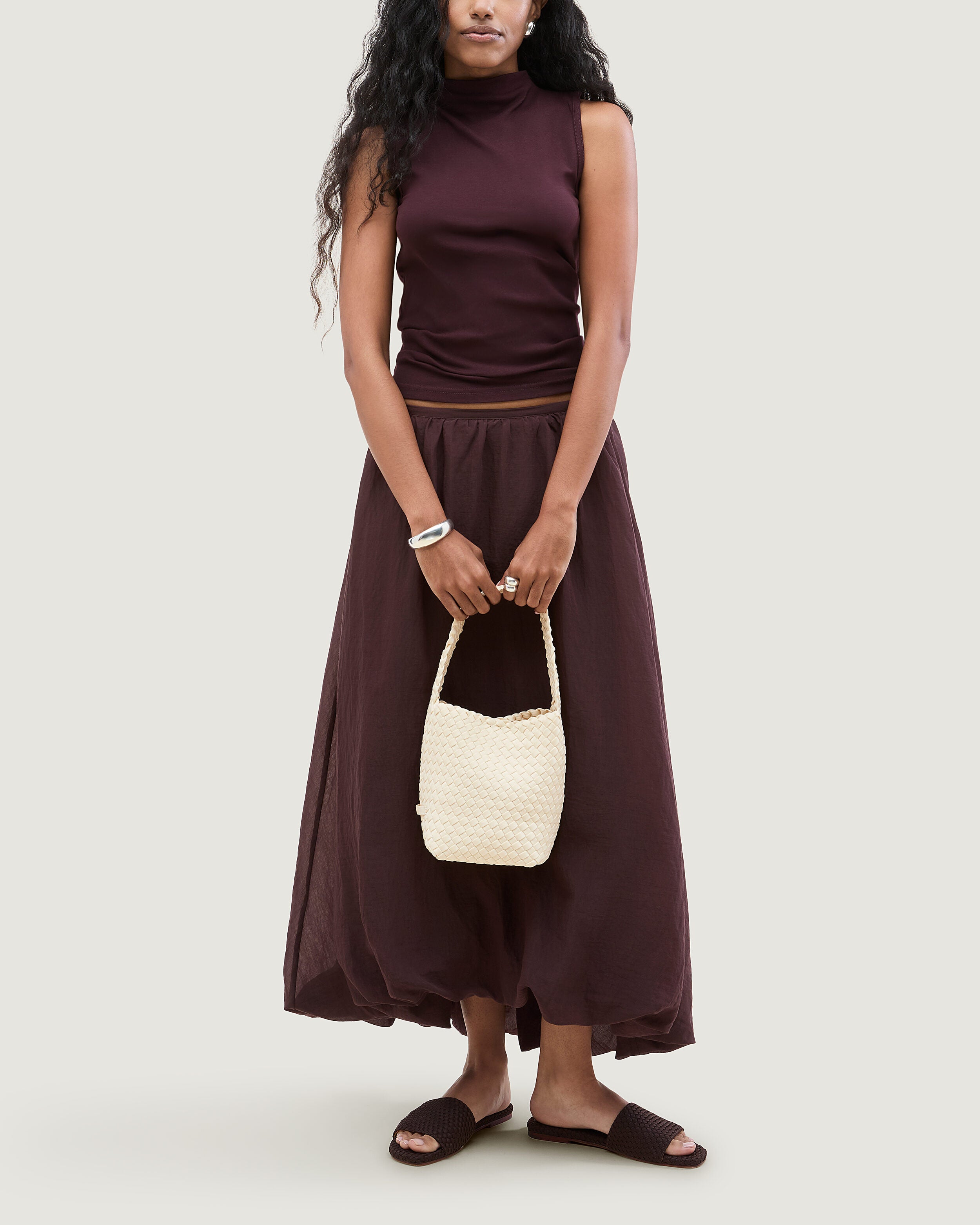 Nomad Hobo in Salt shown on model to illustrate scale and soft silhouette.