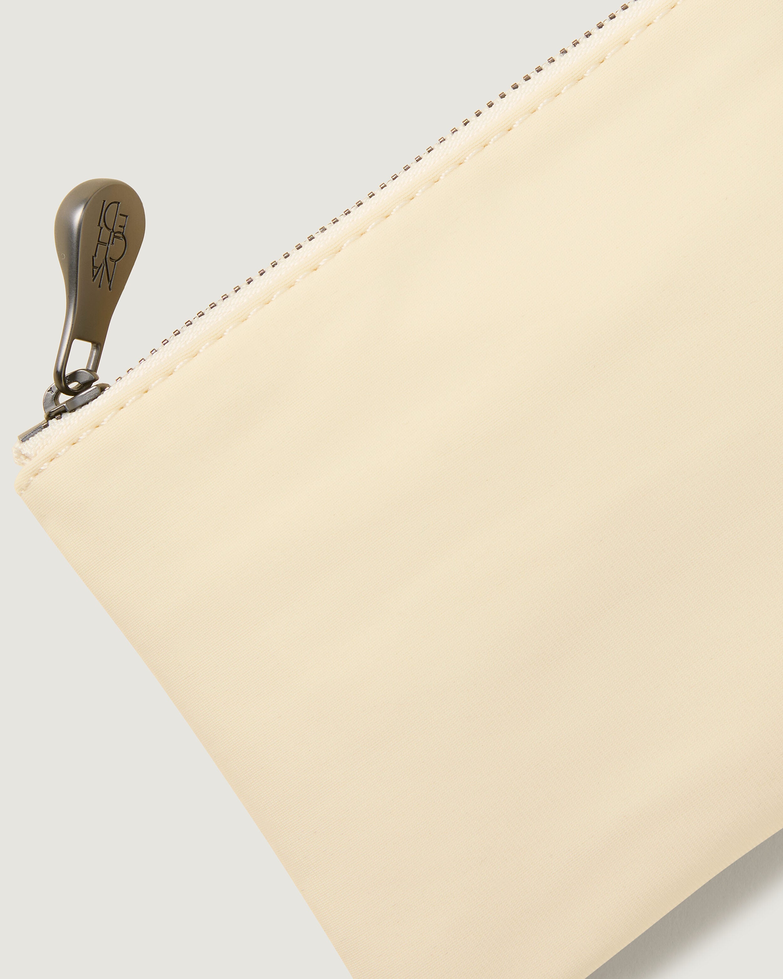 Close-up of included coordinating neoprene zippered pouch.