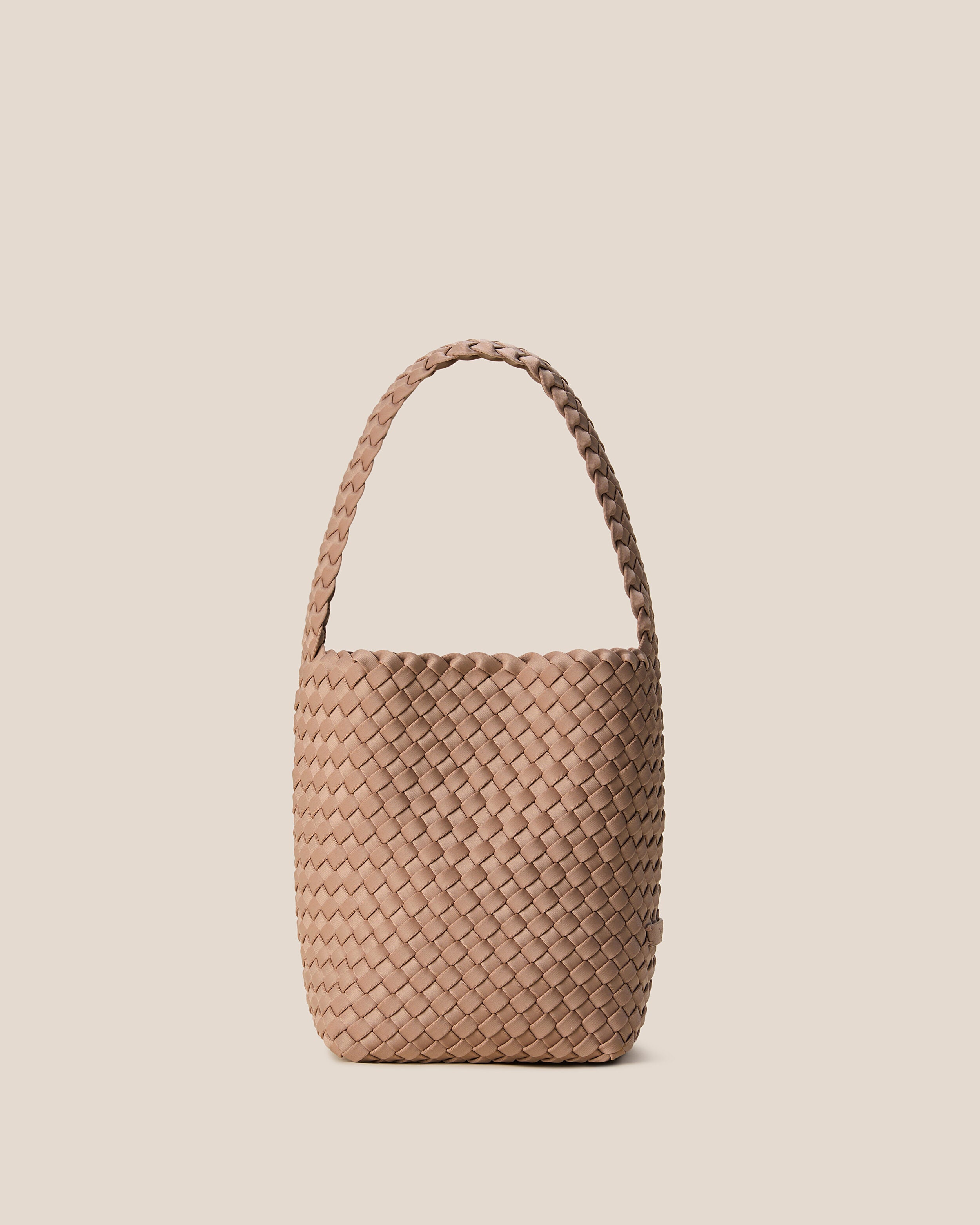 Nomad Hobo in Seychelles, a mocha tone, in handwoven neoprene, featuring an open top with magnetic snap closure, and handwoven shoulder strap lays comfortably flat.