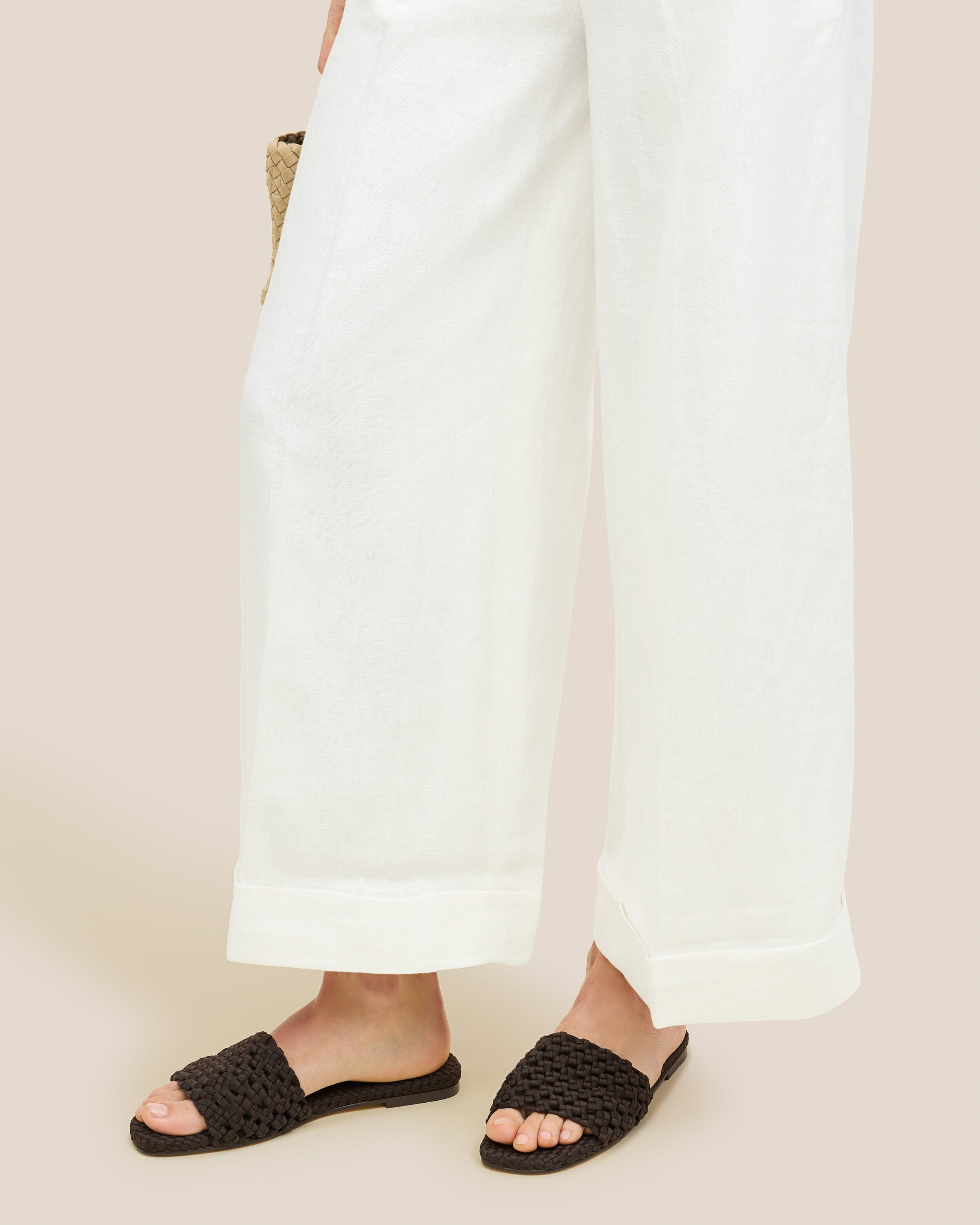 The Ojai Slide in Chocolate shown on model.