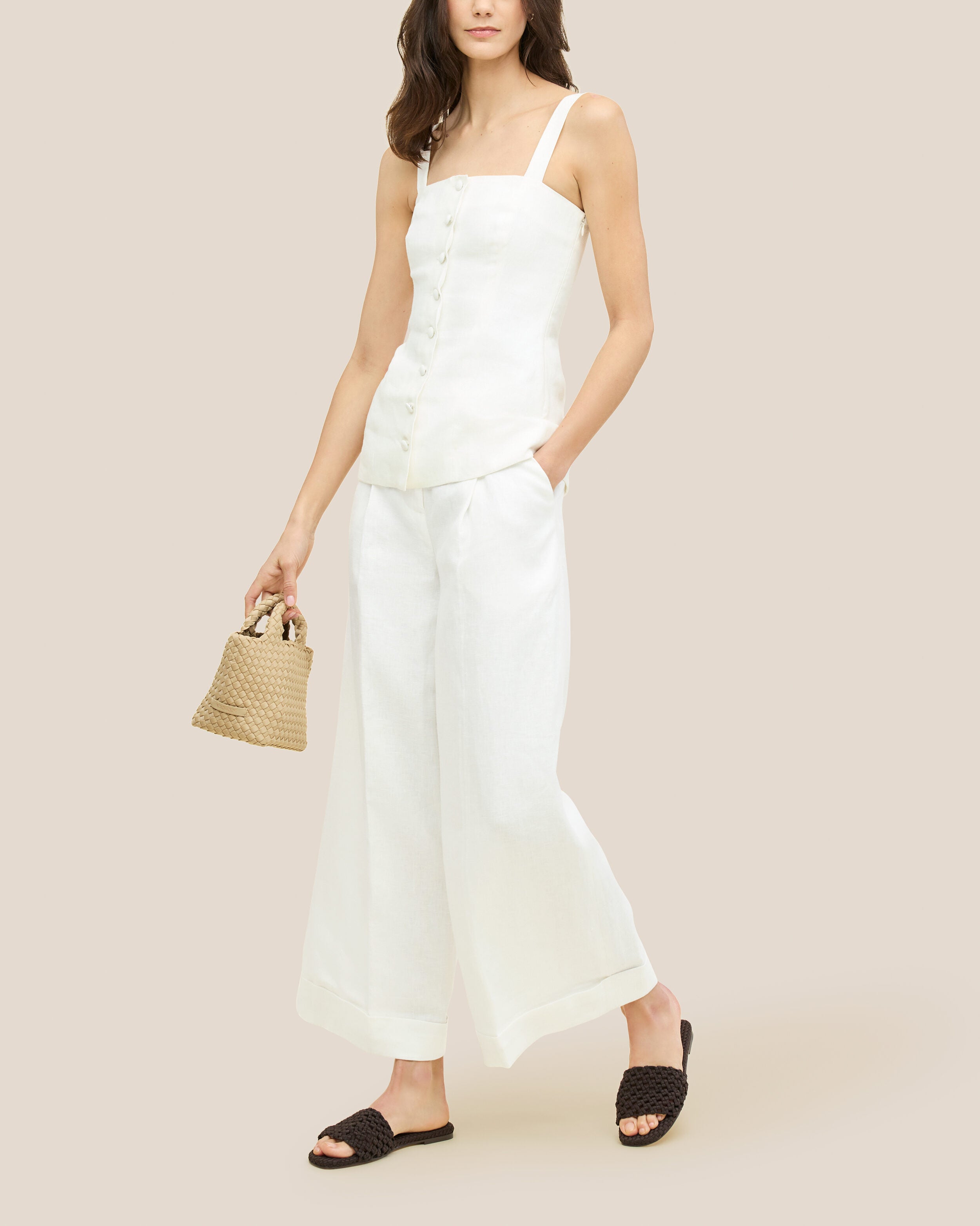 The Ojai Slide in Chocolate shown on model.