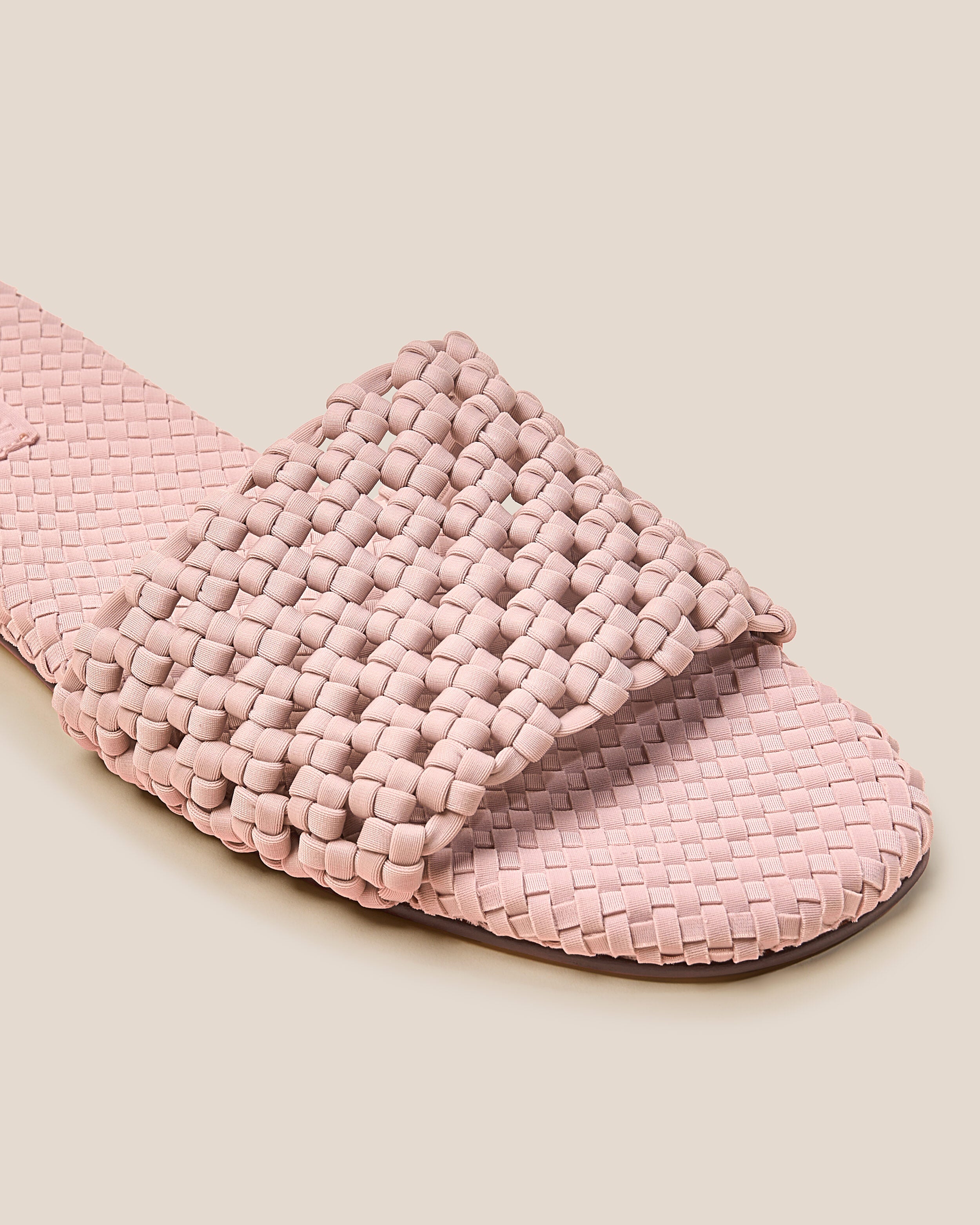 Close-up of The Ojai Slide in Petal showing its open toe and round silhouette.