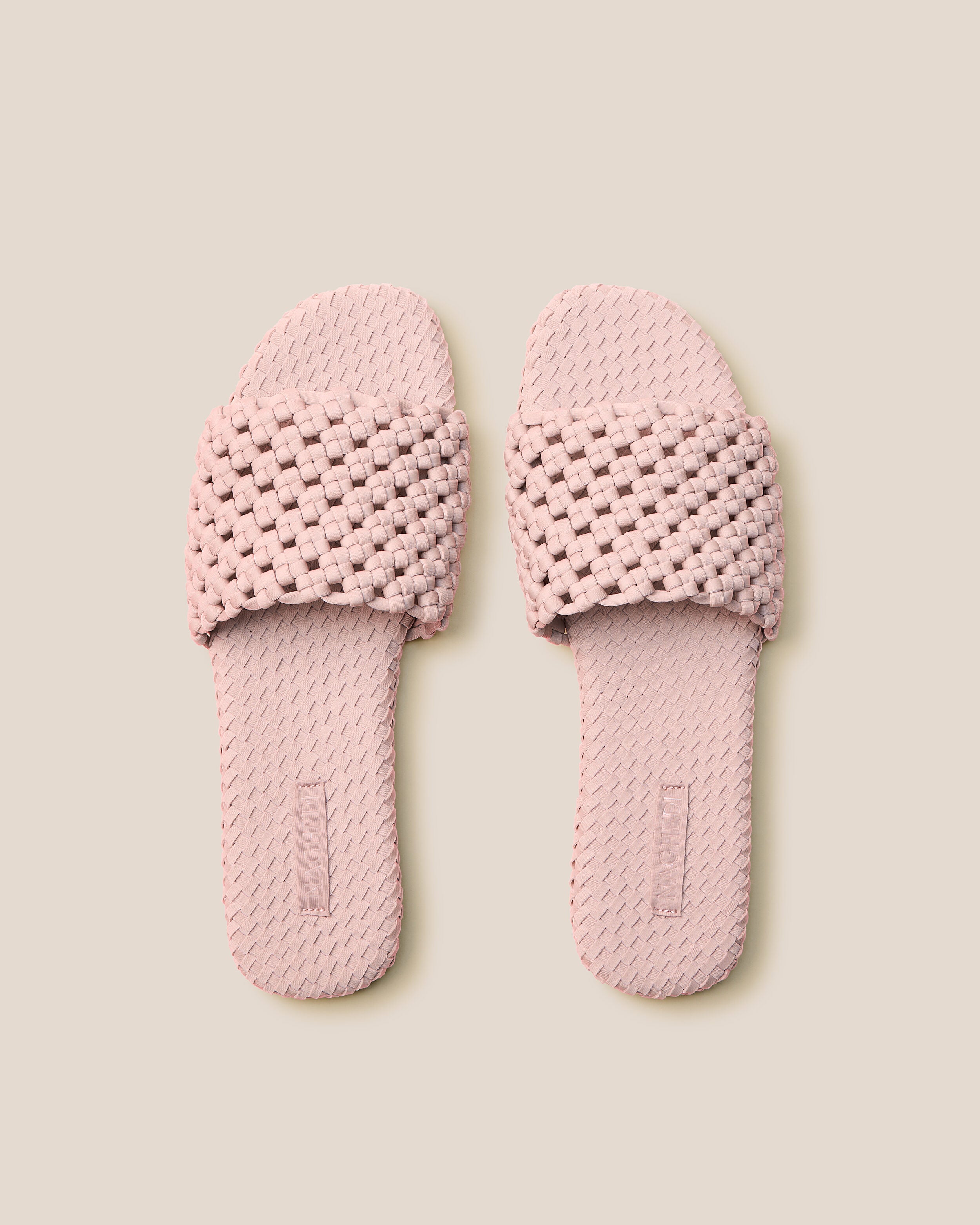 Top view of pair of The Ojai Slide in Petal showing the handwoven neoprene insole.