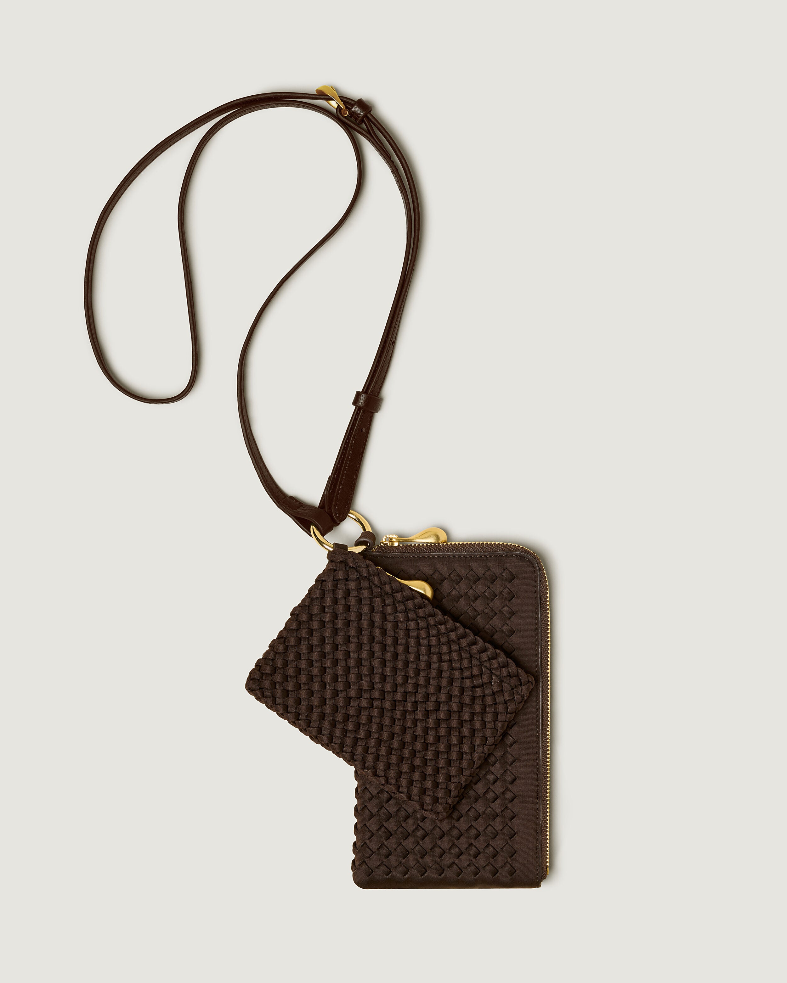 Designer Woven Phone Cases: Minimalist Hands-Free Pouches | NAGHEDI Designer Woven Phone Cases: Minimalist Hands-Free Pouches | NAGHEDI