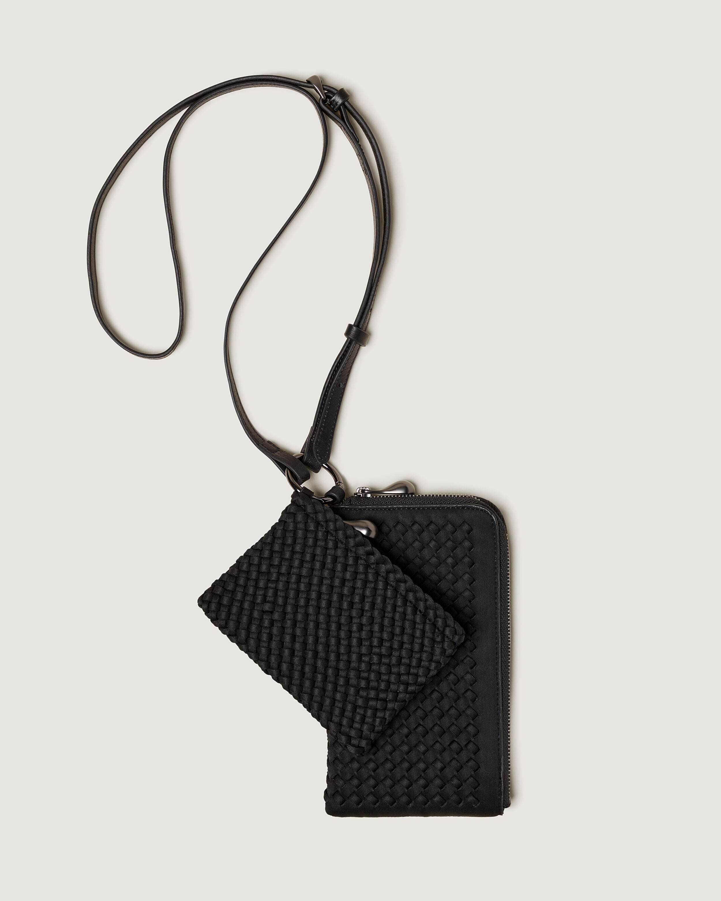 Designer Woven Phone Cases: Minimalist Hands-Free Pouches | NAGHEDI Designer Woven Phone Cases: Minimalist Hands-Free Pouches | NAGHEDI
