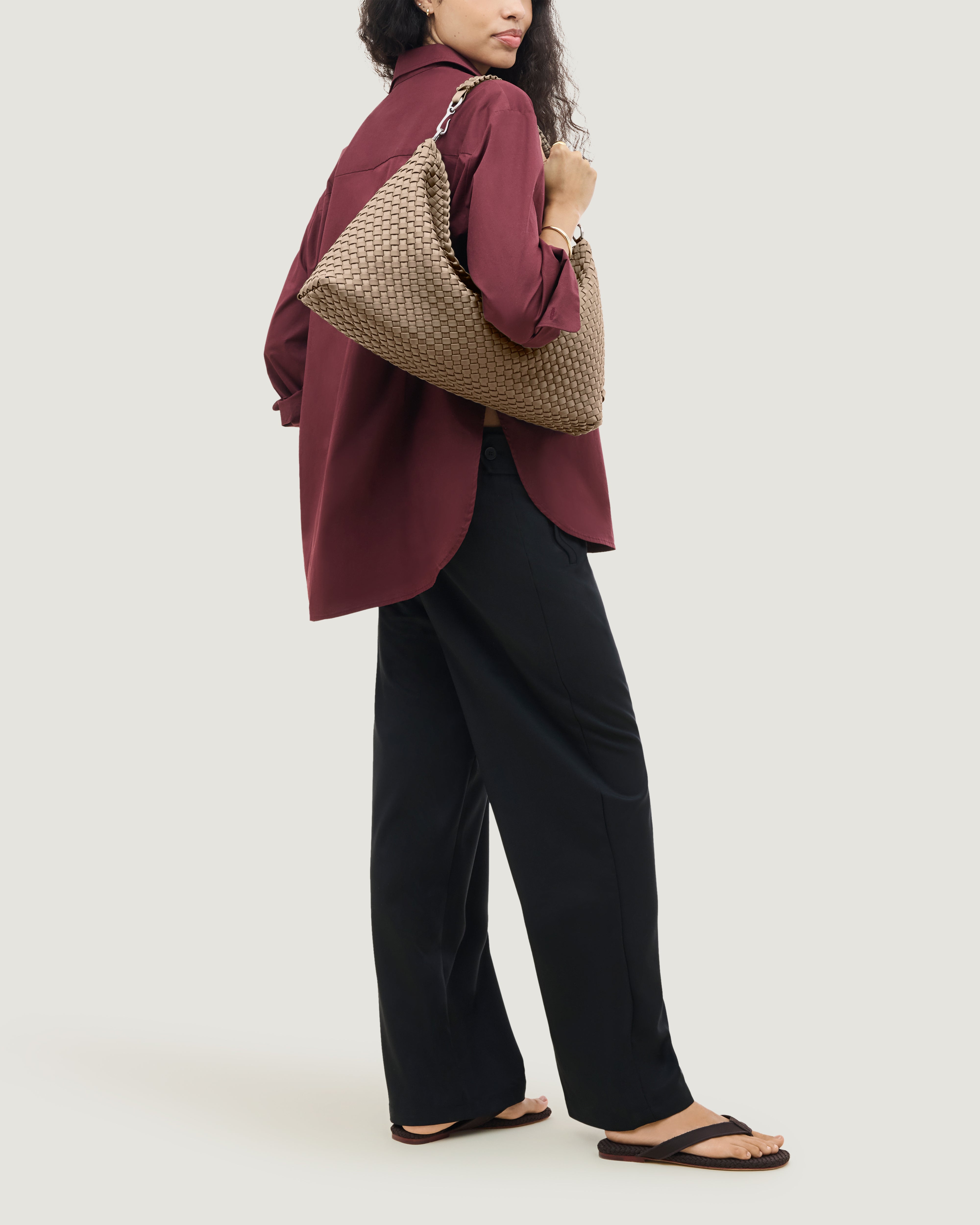 Porto Half-Moon in Cashmere shown on model to illustrate scale and soft silhouette.