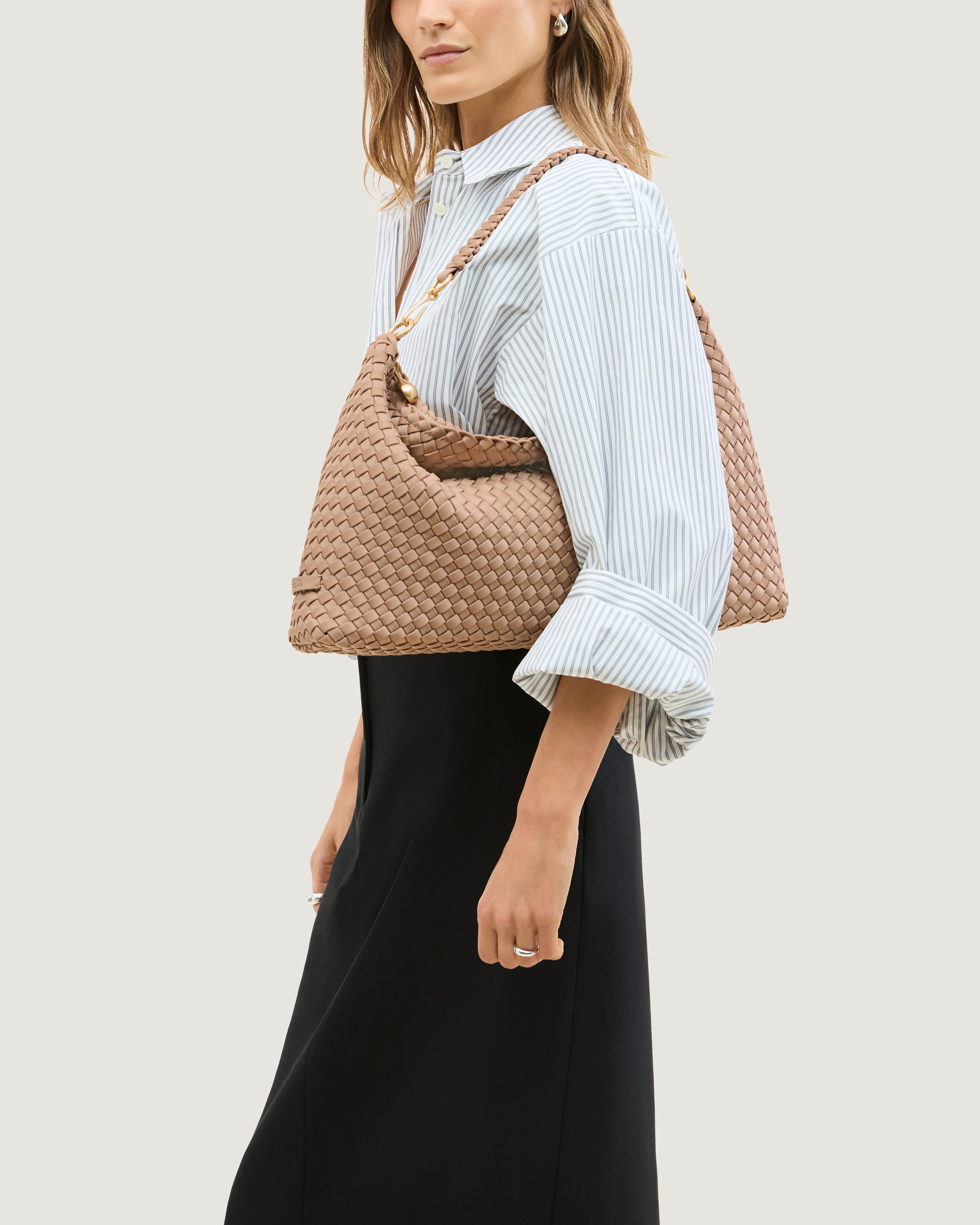Porto Half-Moon in Seychelles shown on model to illustrate scale and soft silhouette.