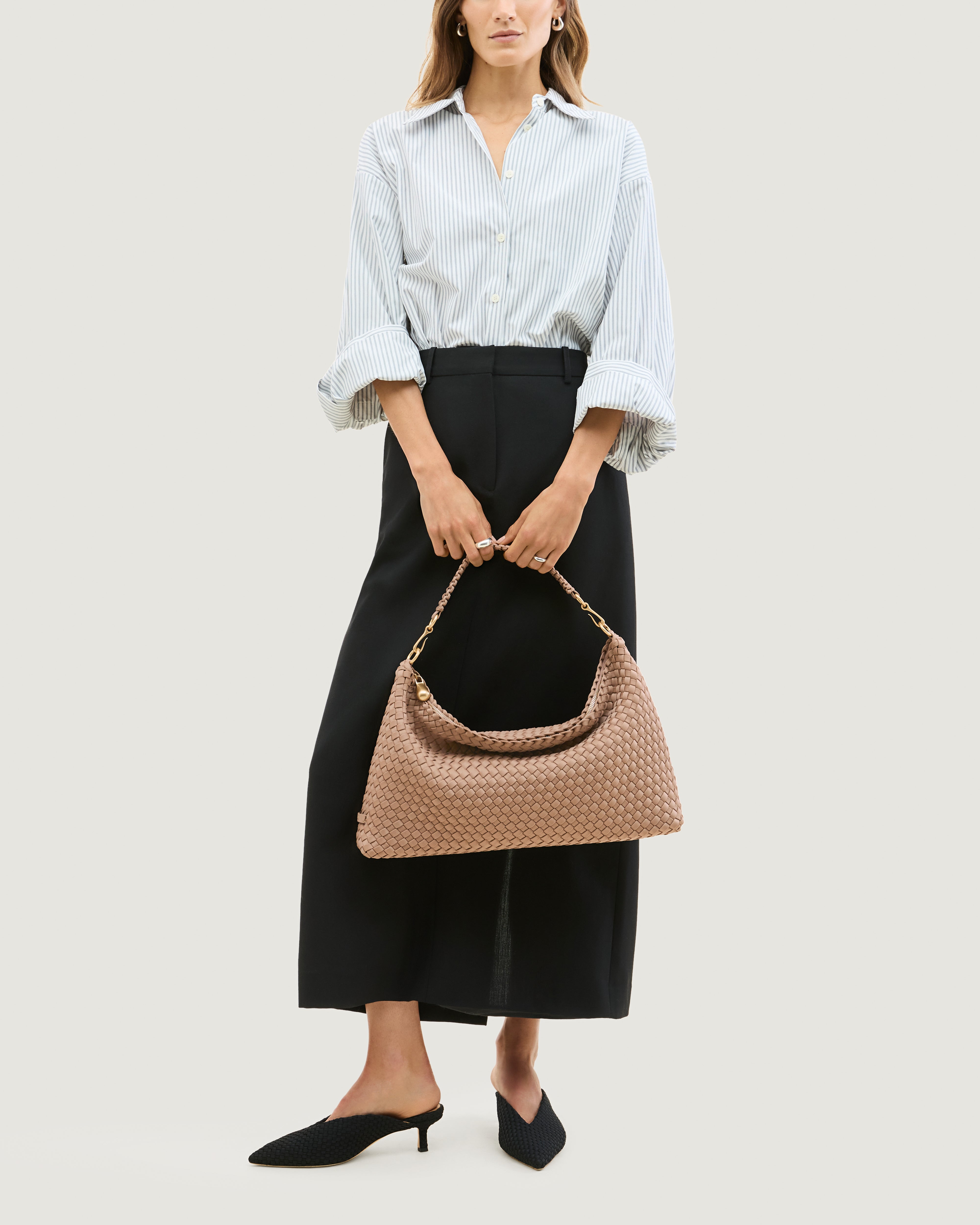 Porto Half-Moon in Seychelles shown on model to illustrate scale and soft silhouette.