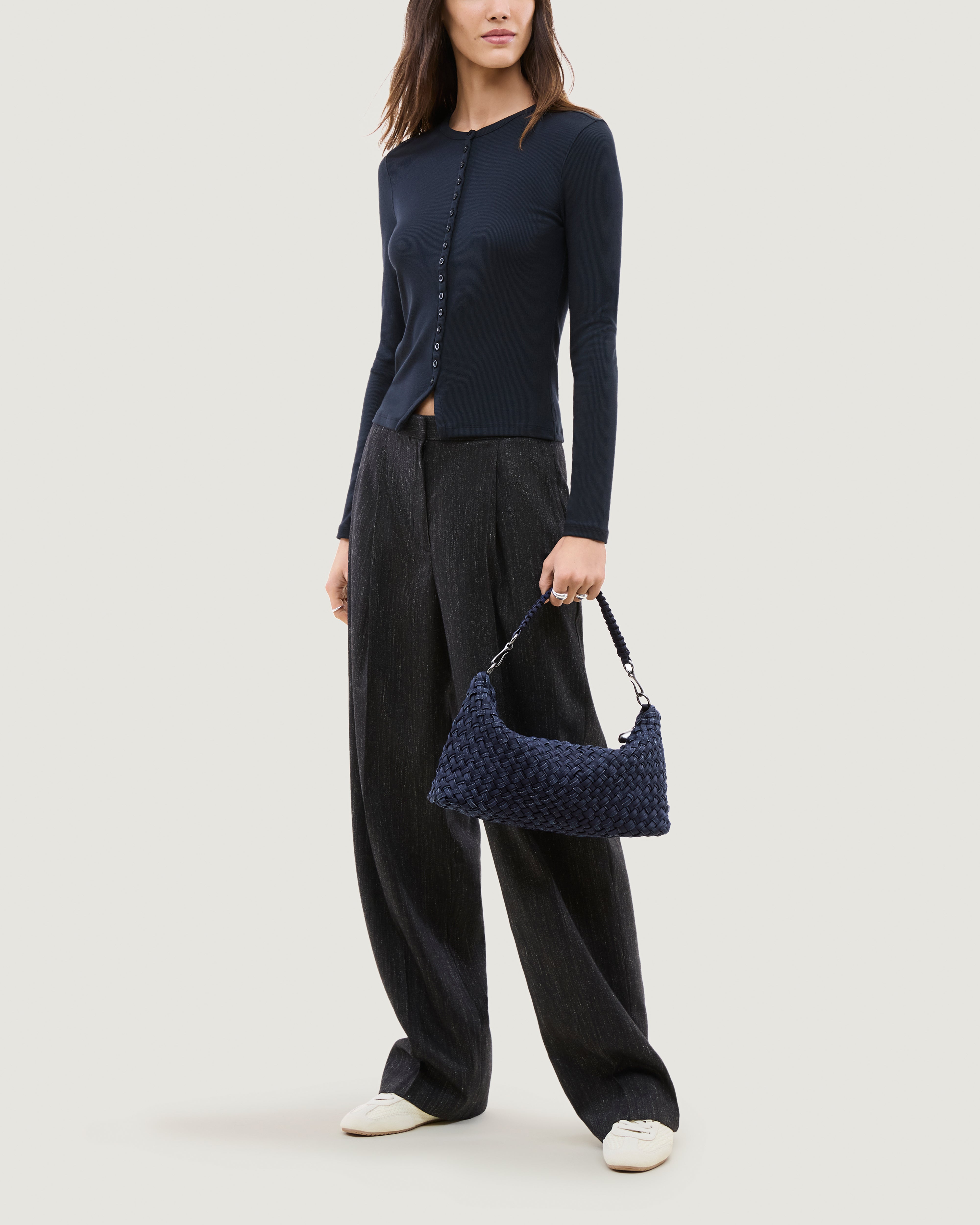 Porto Half-Moon in Indigo shown on model to illustrate scale and soft silhouette.