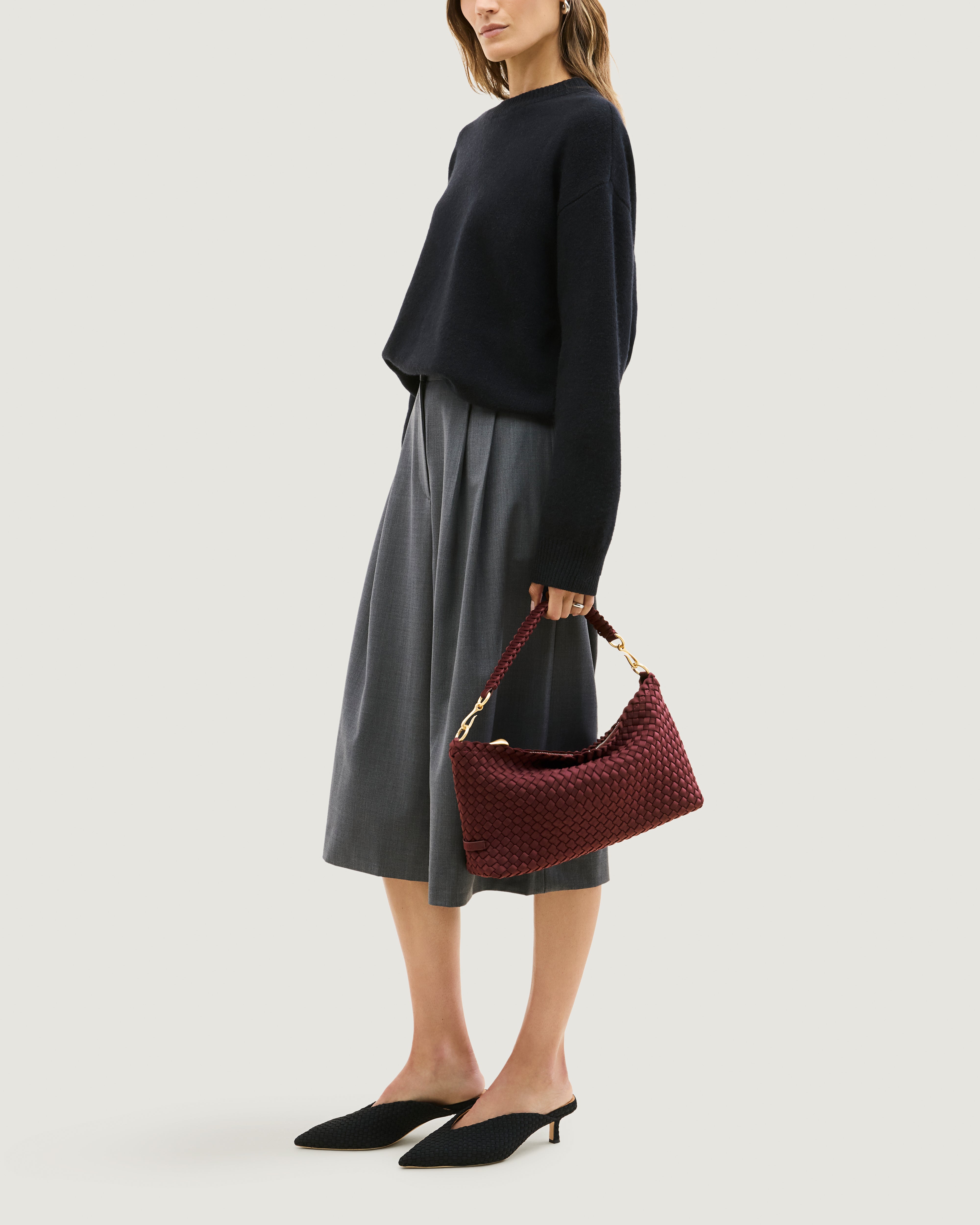 Porto Half-Moon in Bordeaux shown on model to illustrate scale and soft silhouette.