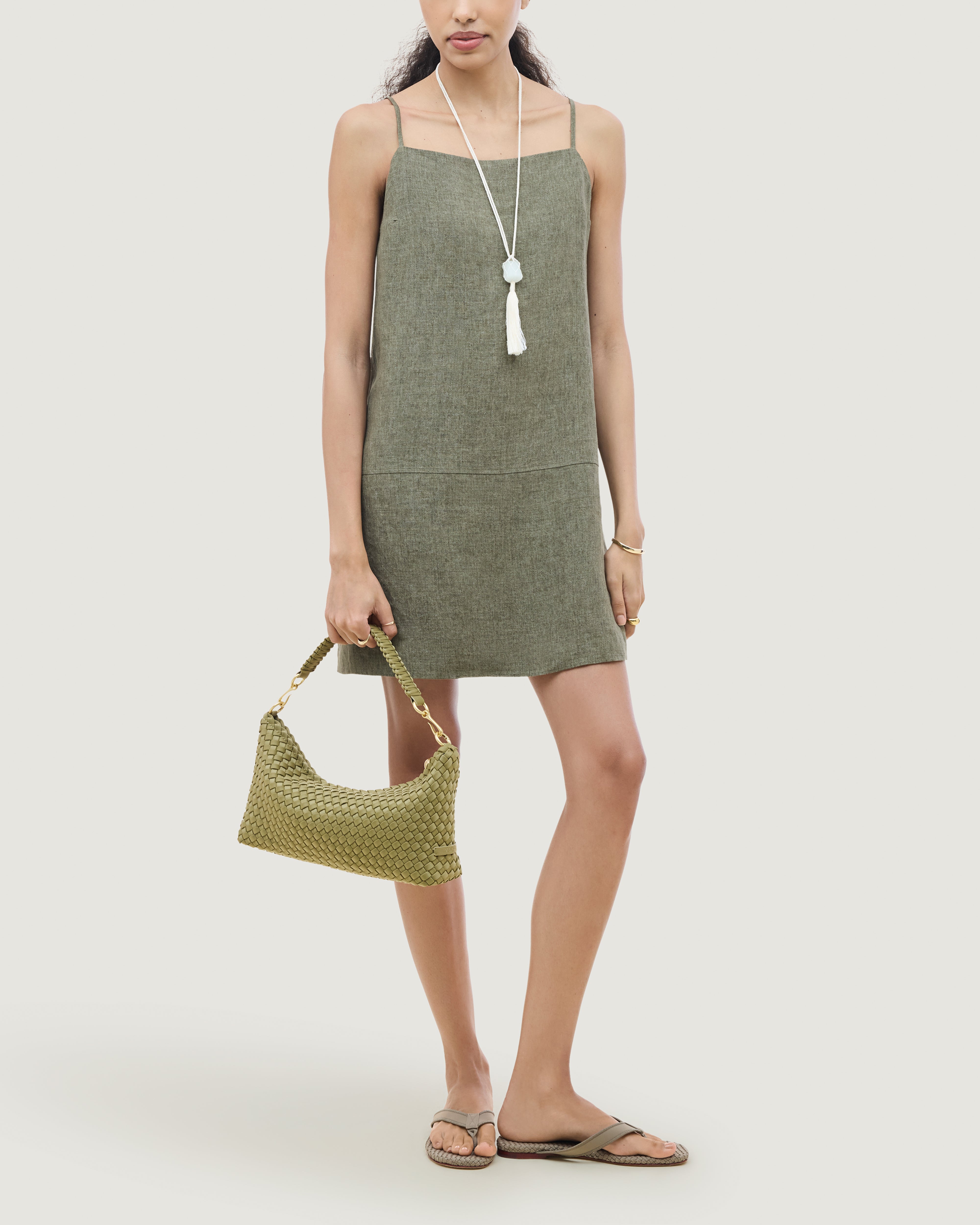Porto Half-Moon in Bottle Green shown on model to illustrate scale and soft silhouette.