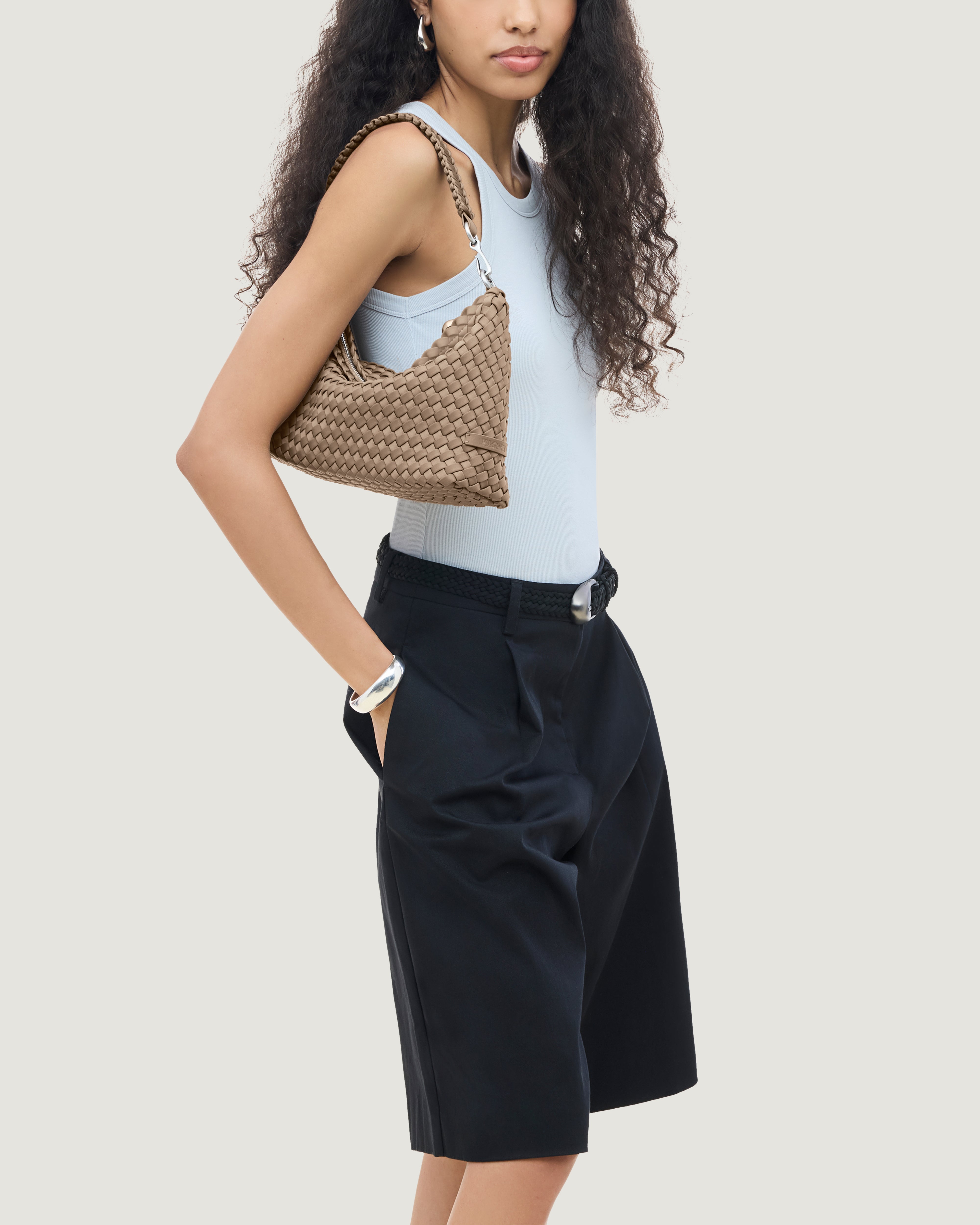 Porto Half-Moon in Cashmere shown on model to illustrate scale and soft silhouette.