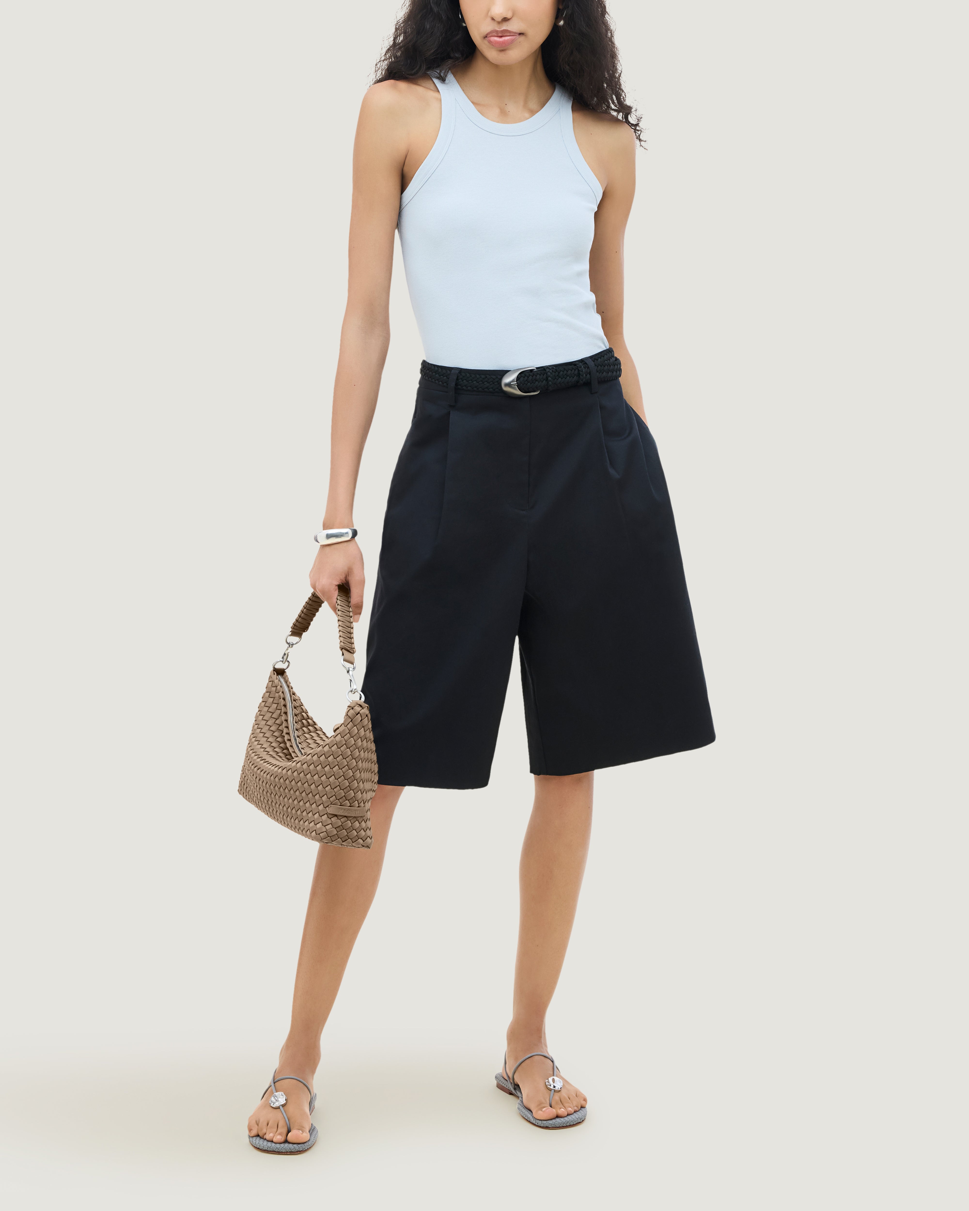 Porto Half-Moon in Cashmere shown on model to illustrate scale and soft silhouette.