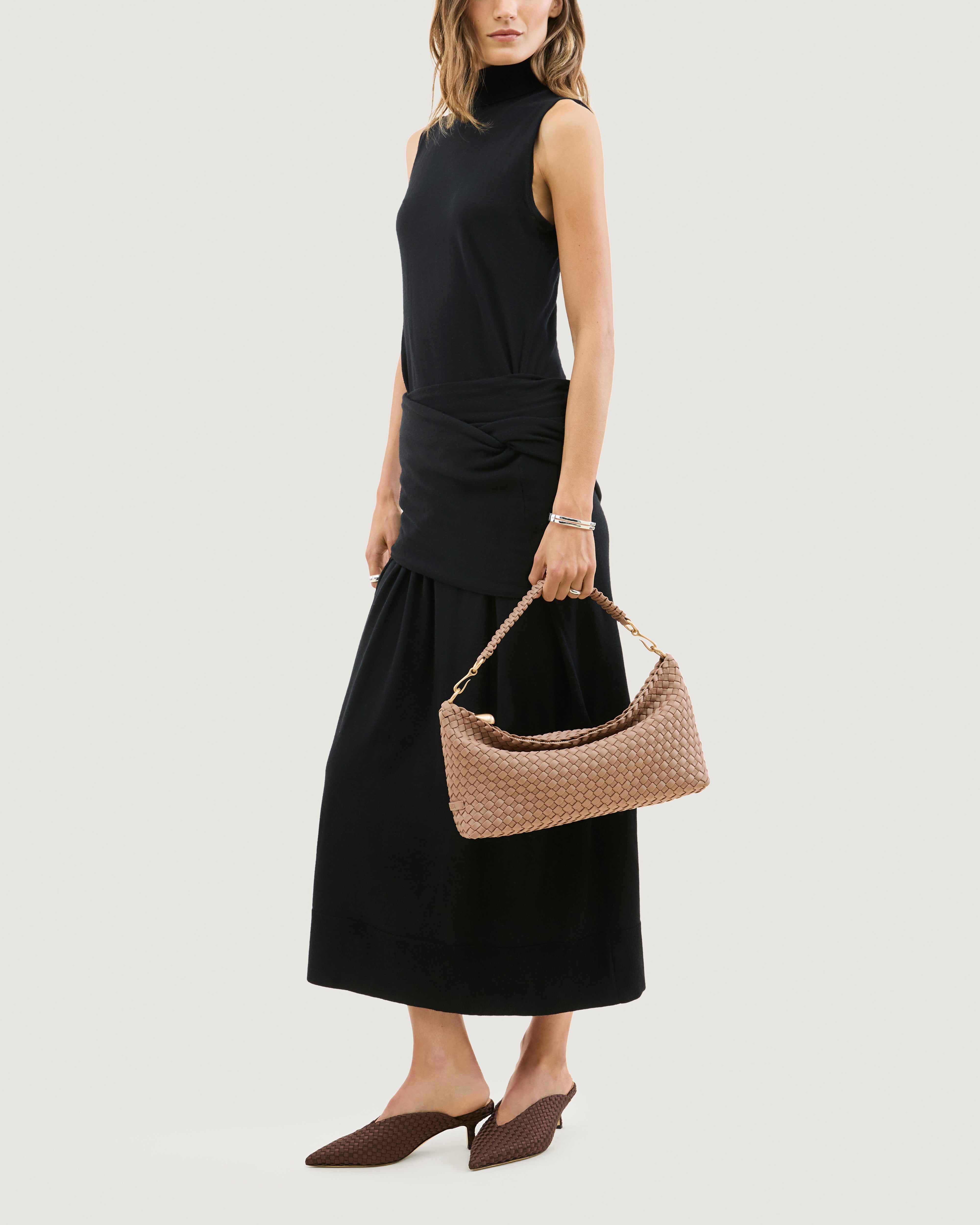 Porto Half-Moon in Seychelles shown on model to illustrate scale and soft silhouette.