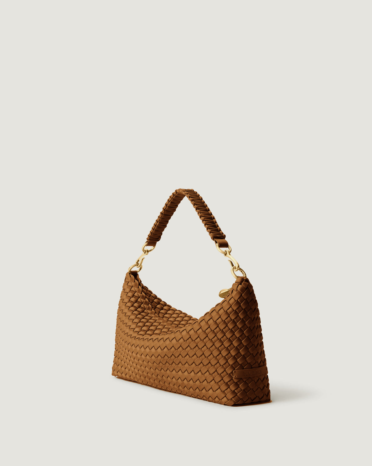 Side view of Porto Small Half Moon in Teak showing handwoven neoprene structure and detachable shoulder strap.