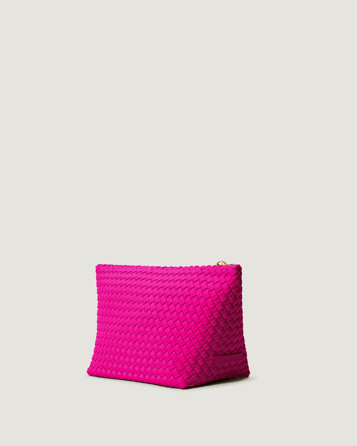 Portofino Cosmetic Pouch in Miami Pink shown from a side angle, highlighting its handwoven neoprene construction and zip closure.