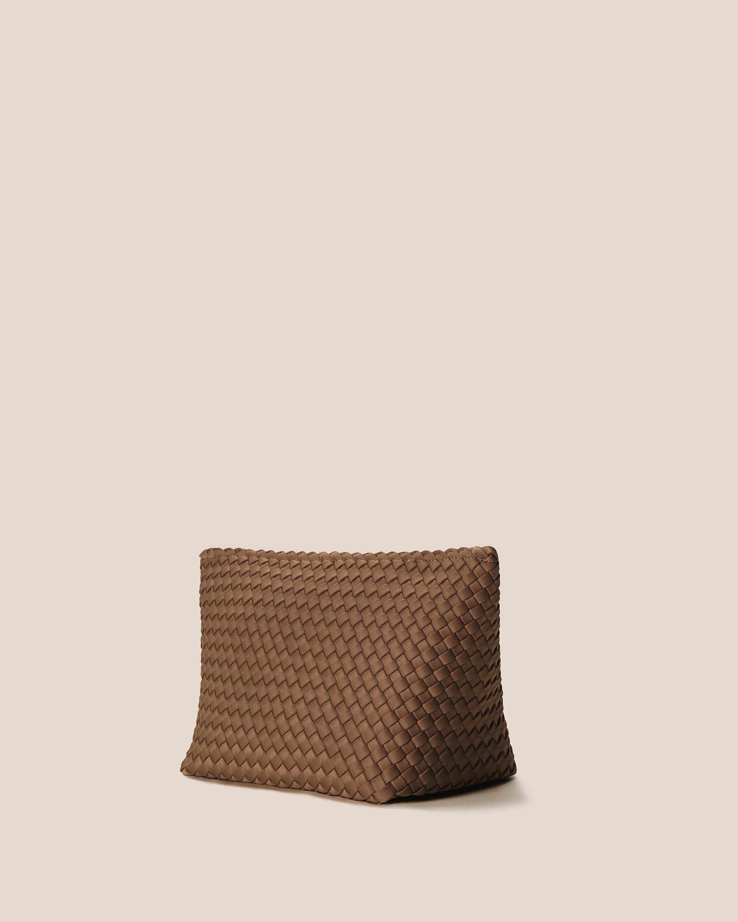 Portofino Cosmetic Pouch in Mink shown from a side angle, highlighting its handwoven neoprene construction and zip closure.