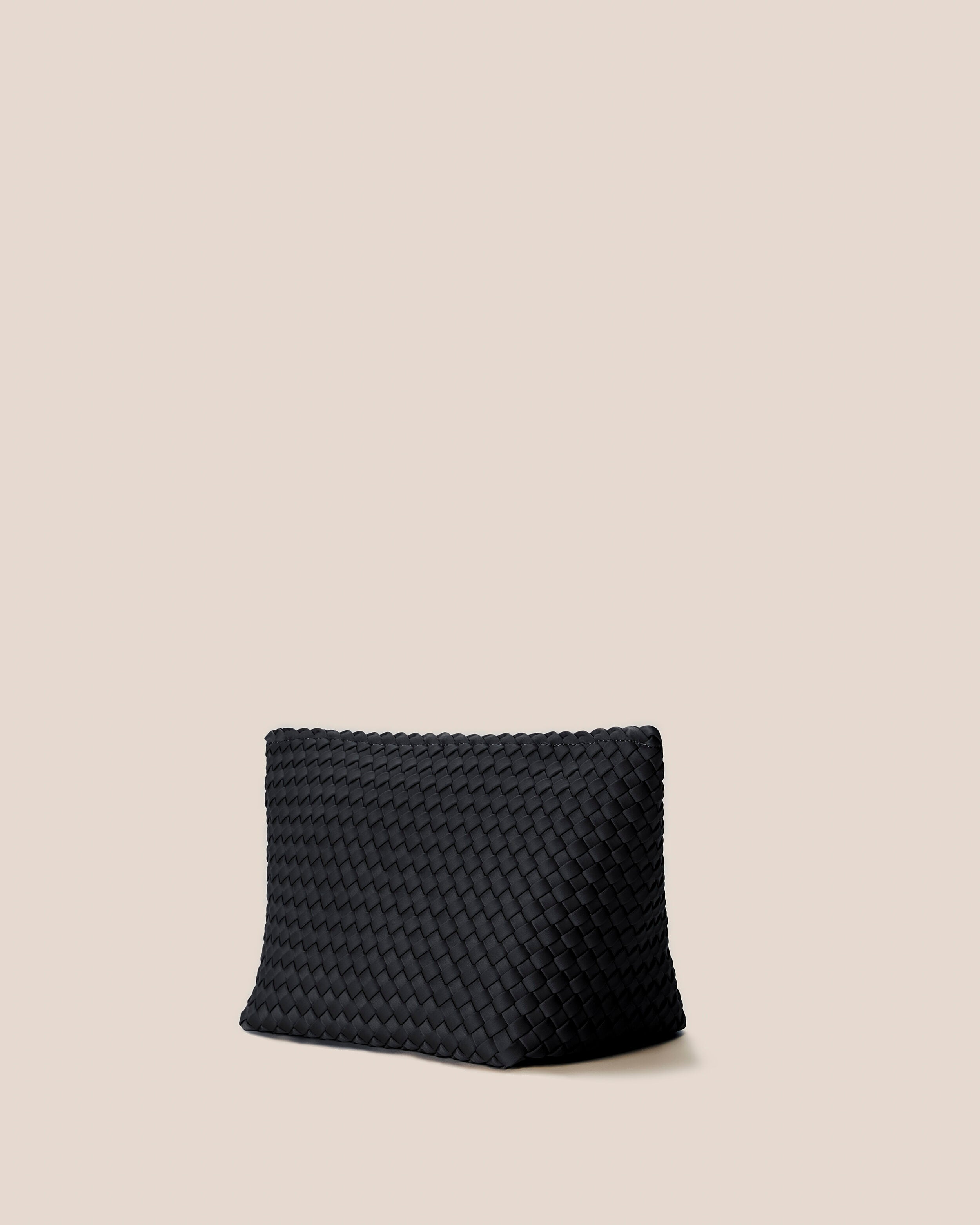 Portofino Cosmetic Pouch in Onyx shown from a side angle, highlighting its handwoven neoprene construction and zip closure.