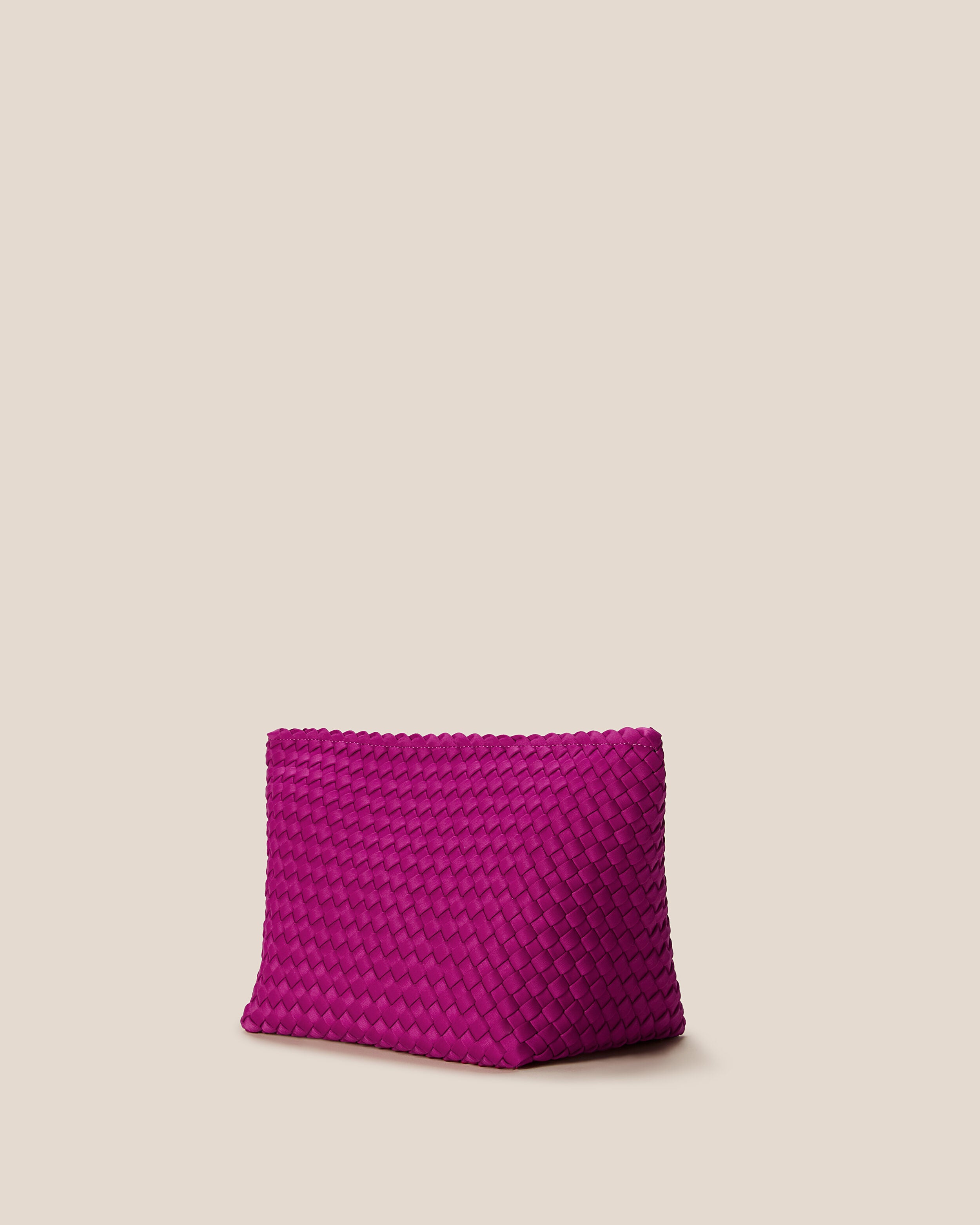 Portofino Cosmetic Pouch in Rio shown from a side angle, highlighting its handwoven neoprene construction and zip closure.
