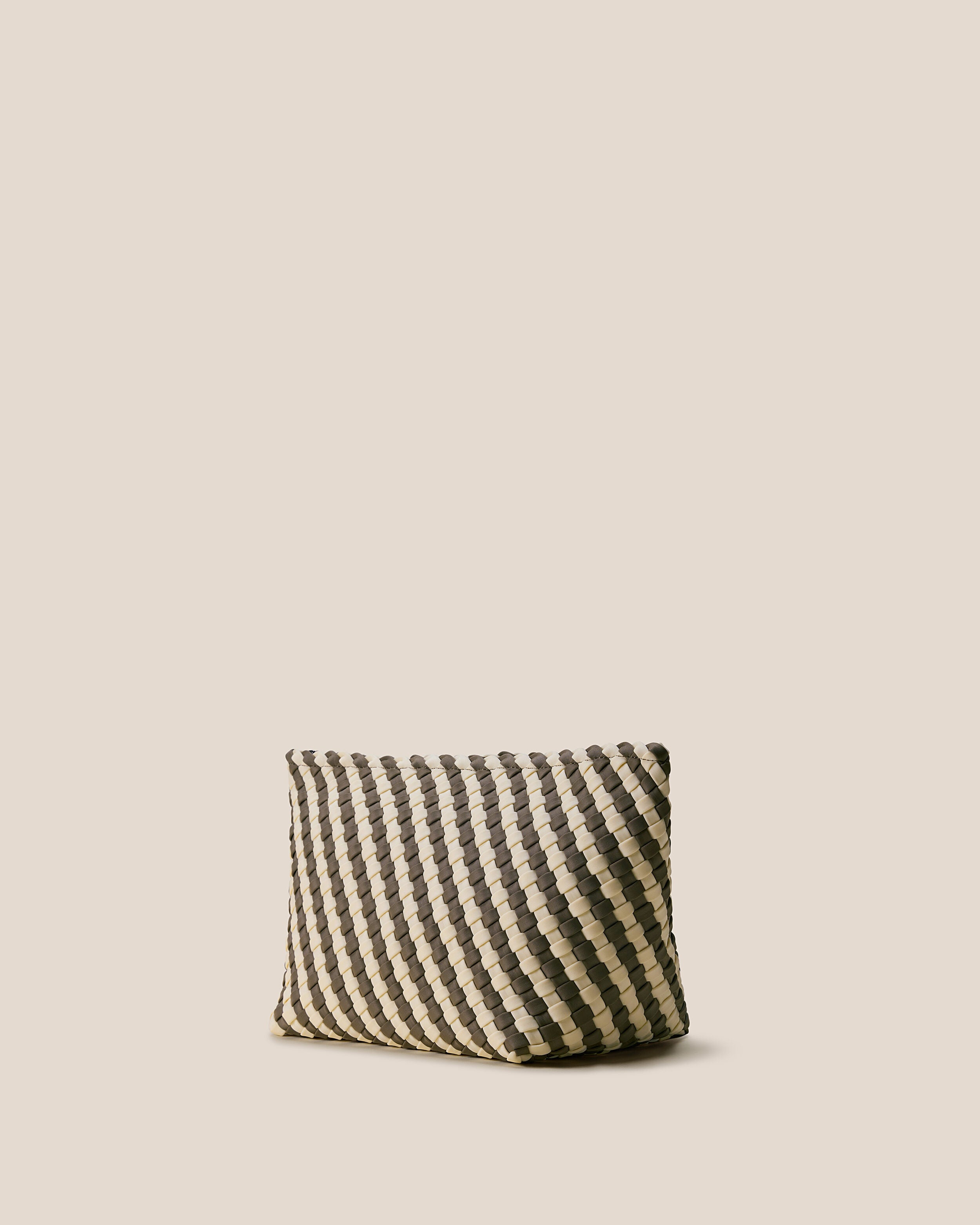 Portofino Cosmetic Pouch in Carrara shown from a side angle, highlighting its handwoven neoprene construction and zip closure.