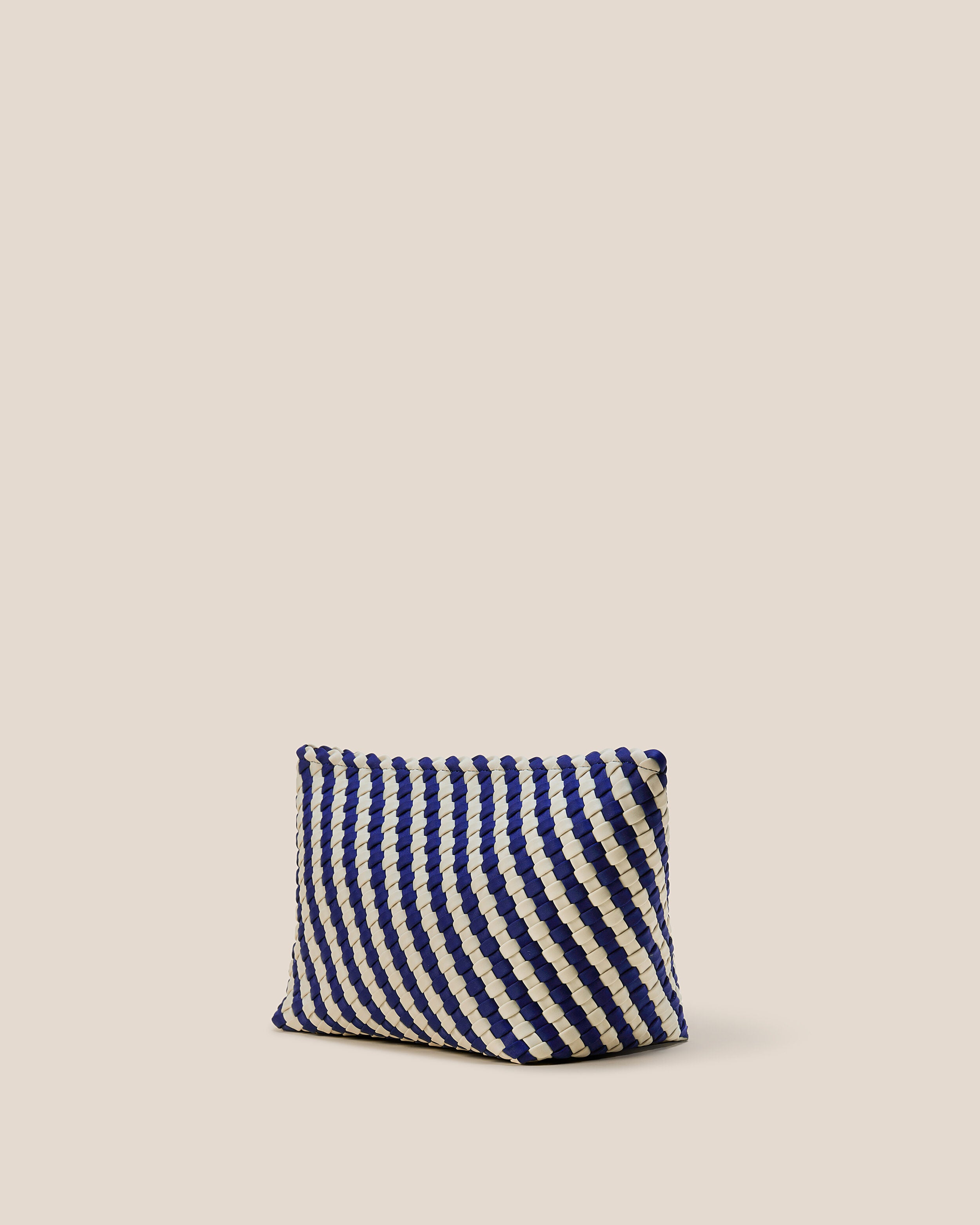 Portofino Cosmetic Pouch in Venice shown from a side angle, highlighting its handwoven neoprene construction and zip closure.