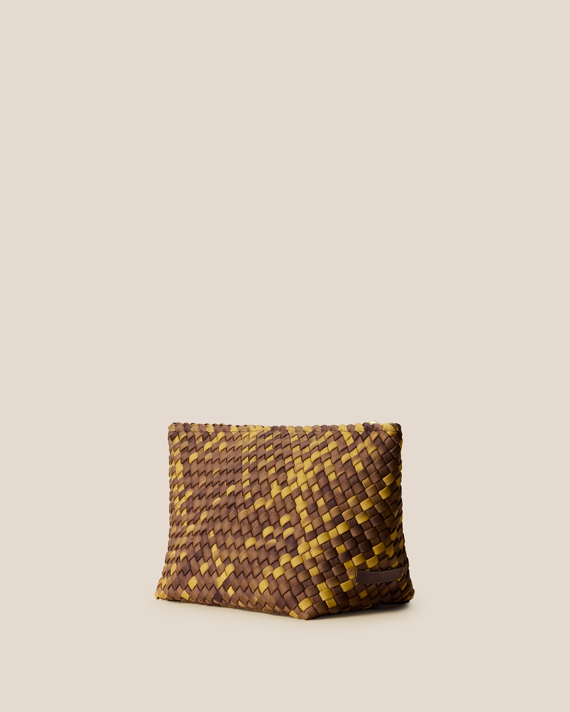 Portofino Large Watercolor Cosmetic Pouch in Tortoiseshell shown from a side angle, highlighting its handwoven neoprene and zip closure.