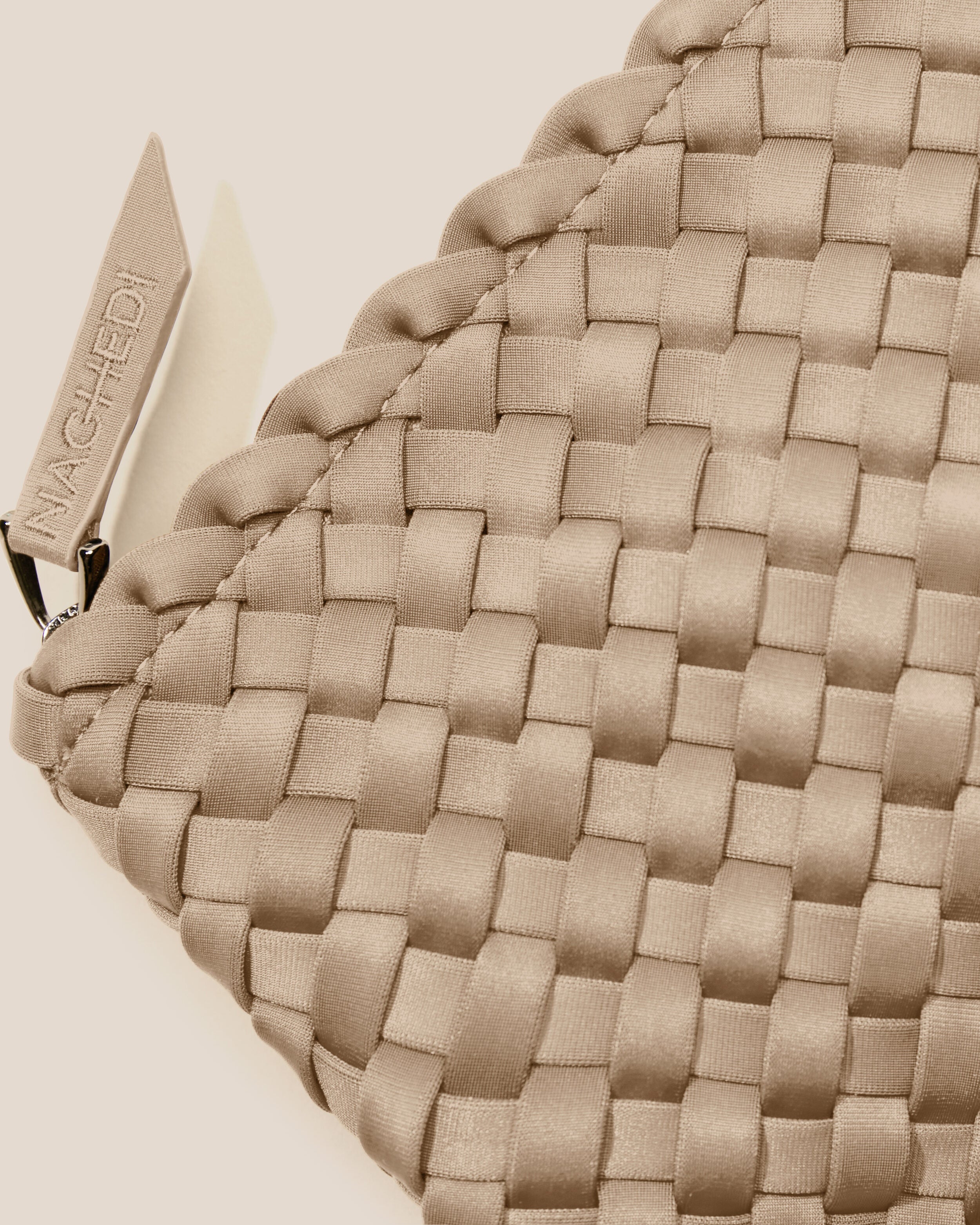 Close-up of handwoven detailing on Portofino Cosmetic Pouch in Cashmere.