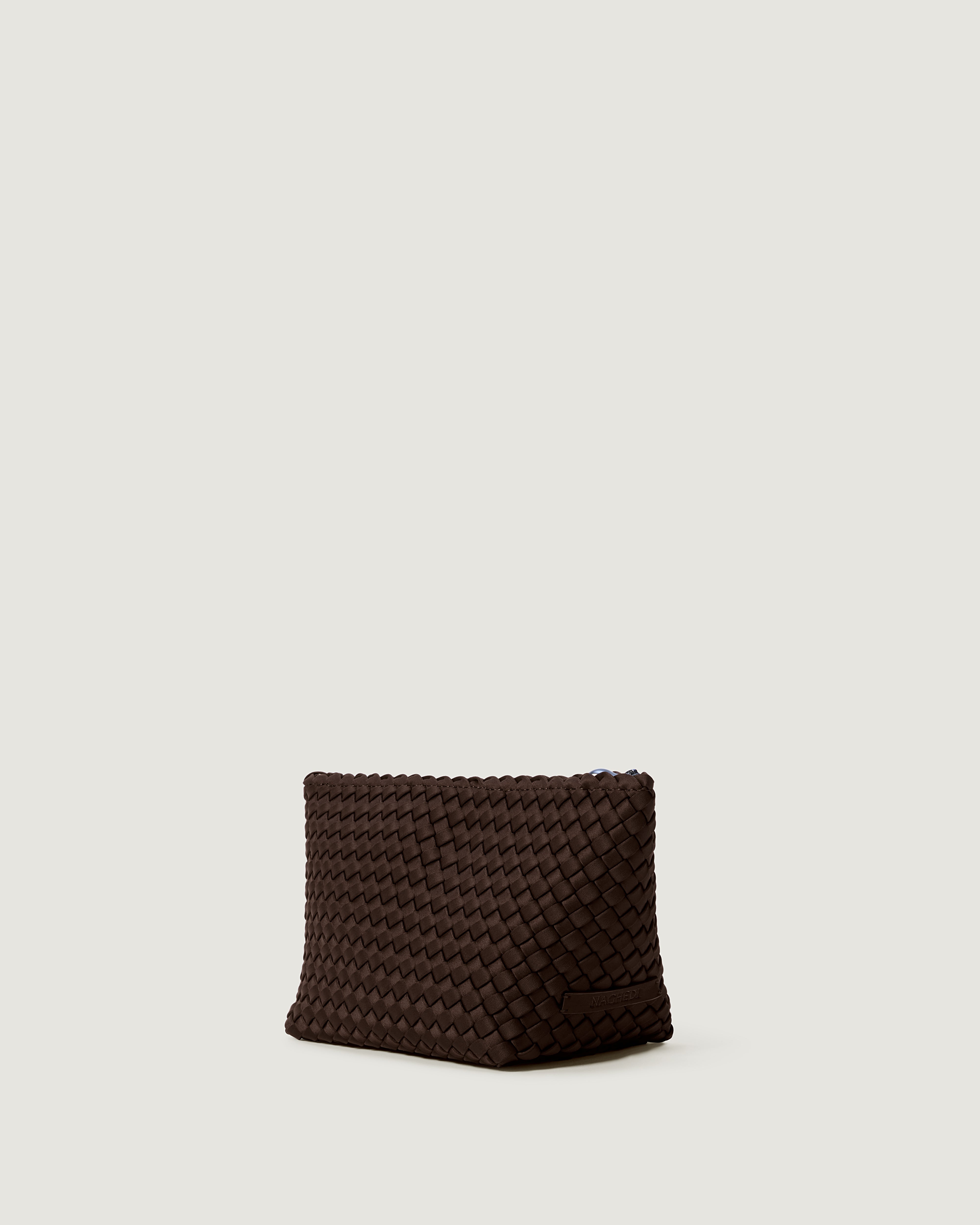 Portofino Cosmetic Pouch in Chocolate shown from a side angle, highlighting its handwoven neoprene construction and zip closure.