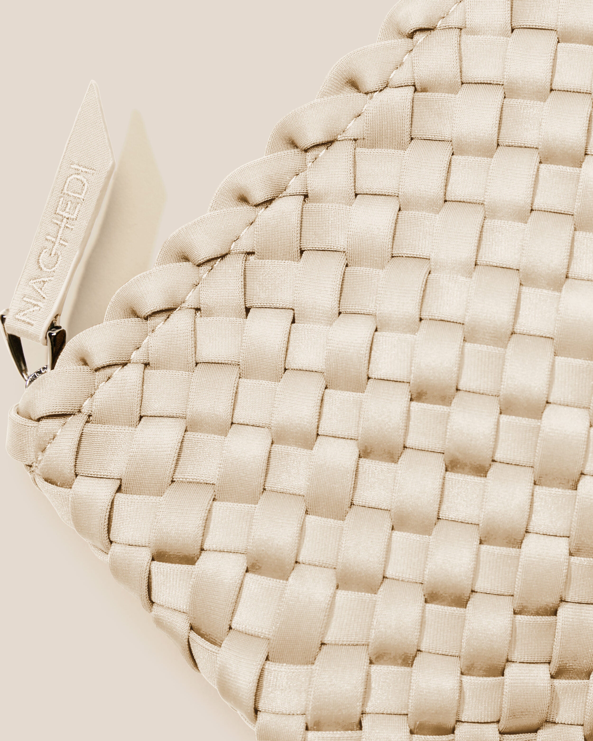 Close-up of handwoven detailing on Portofino Cosmetic Pouch in Ecru.