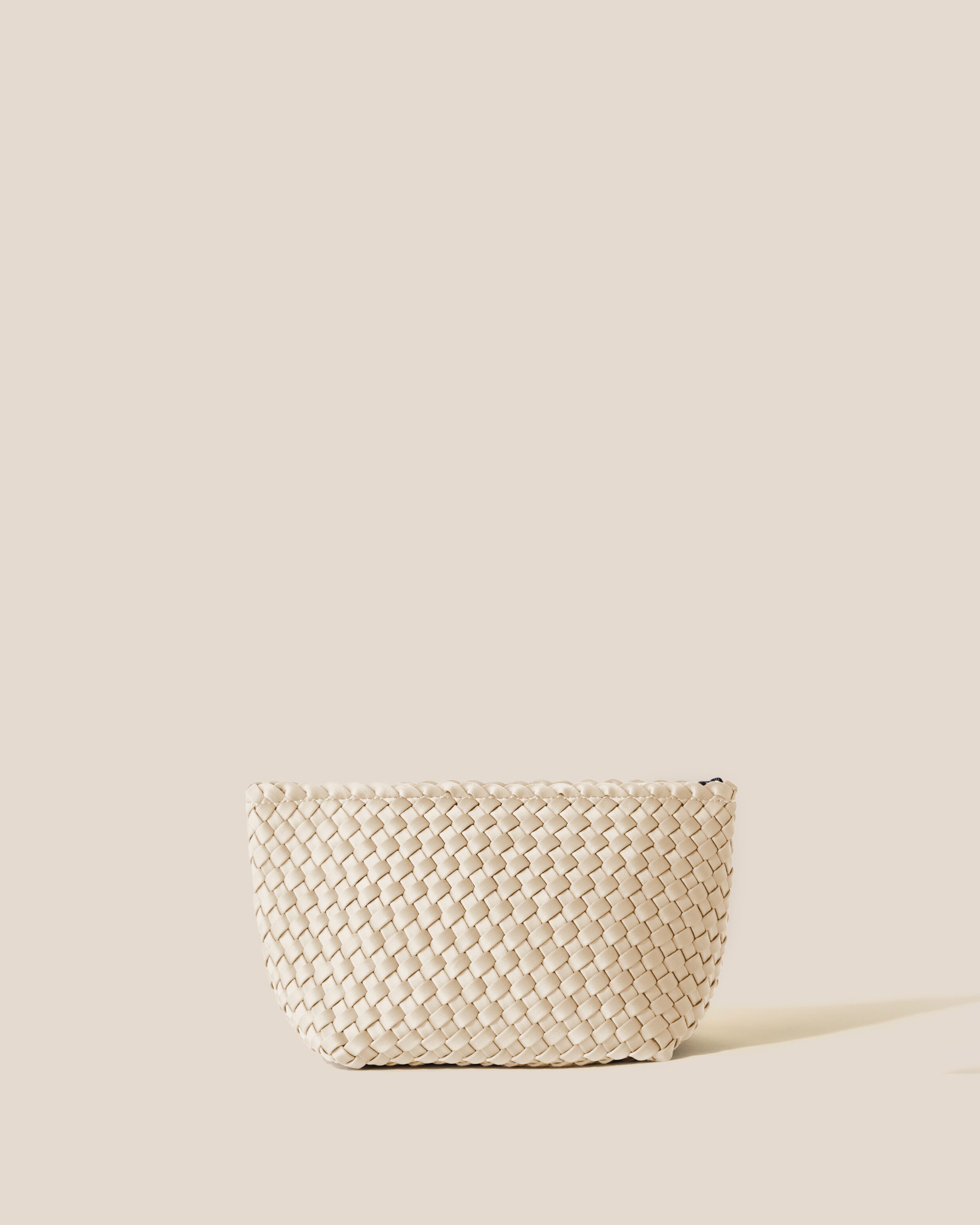 Portofino Cosmetic Pouch in Ecru, a cream tone, in handwoven neoprene, featuring a zip closure.