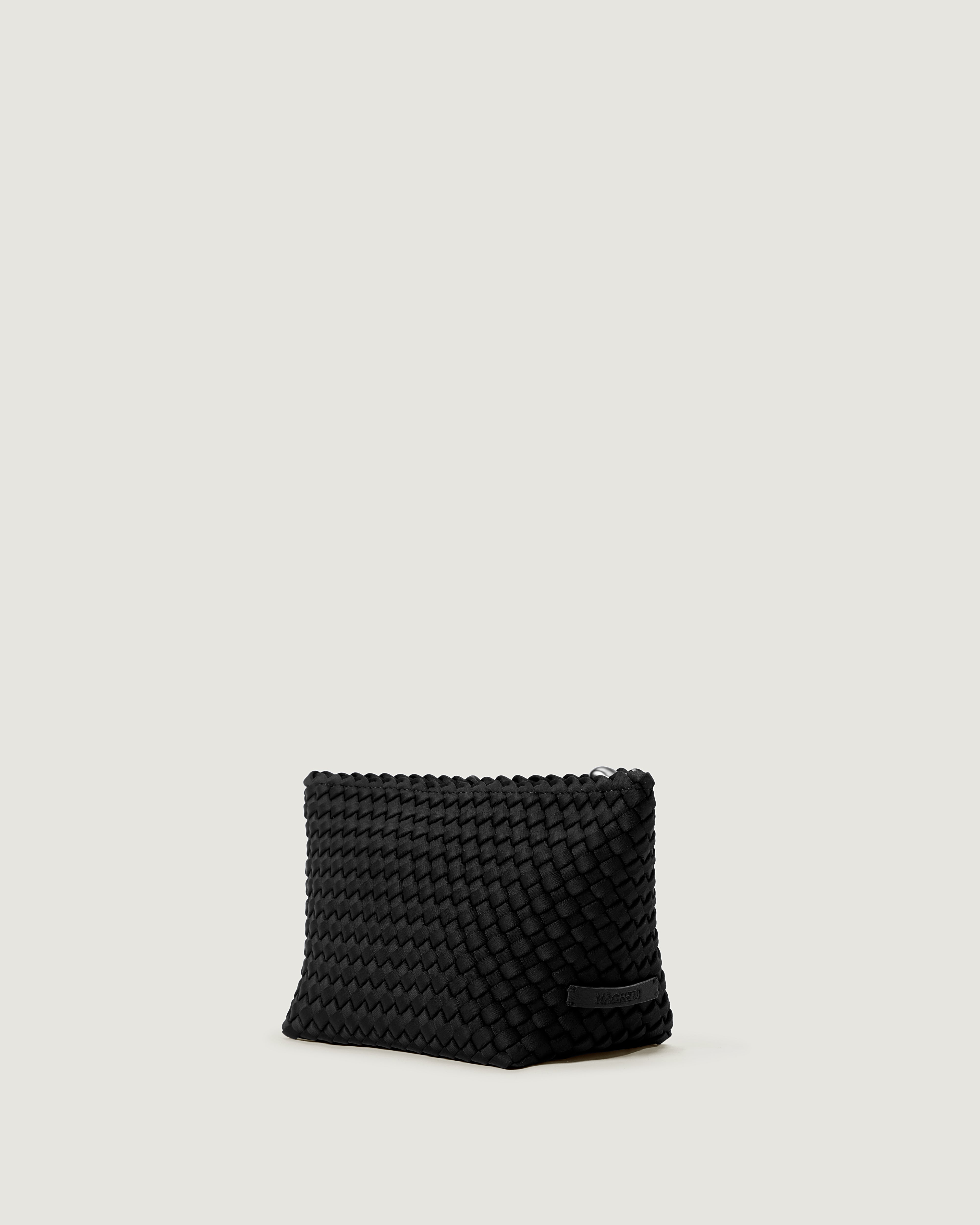 Portofino Cosmetic Pouch in Onyx shown from a side angle, highlighting its handwoven neoprene construction and zip closure.