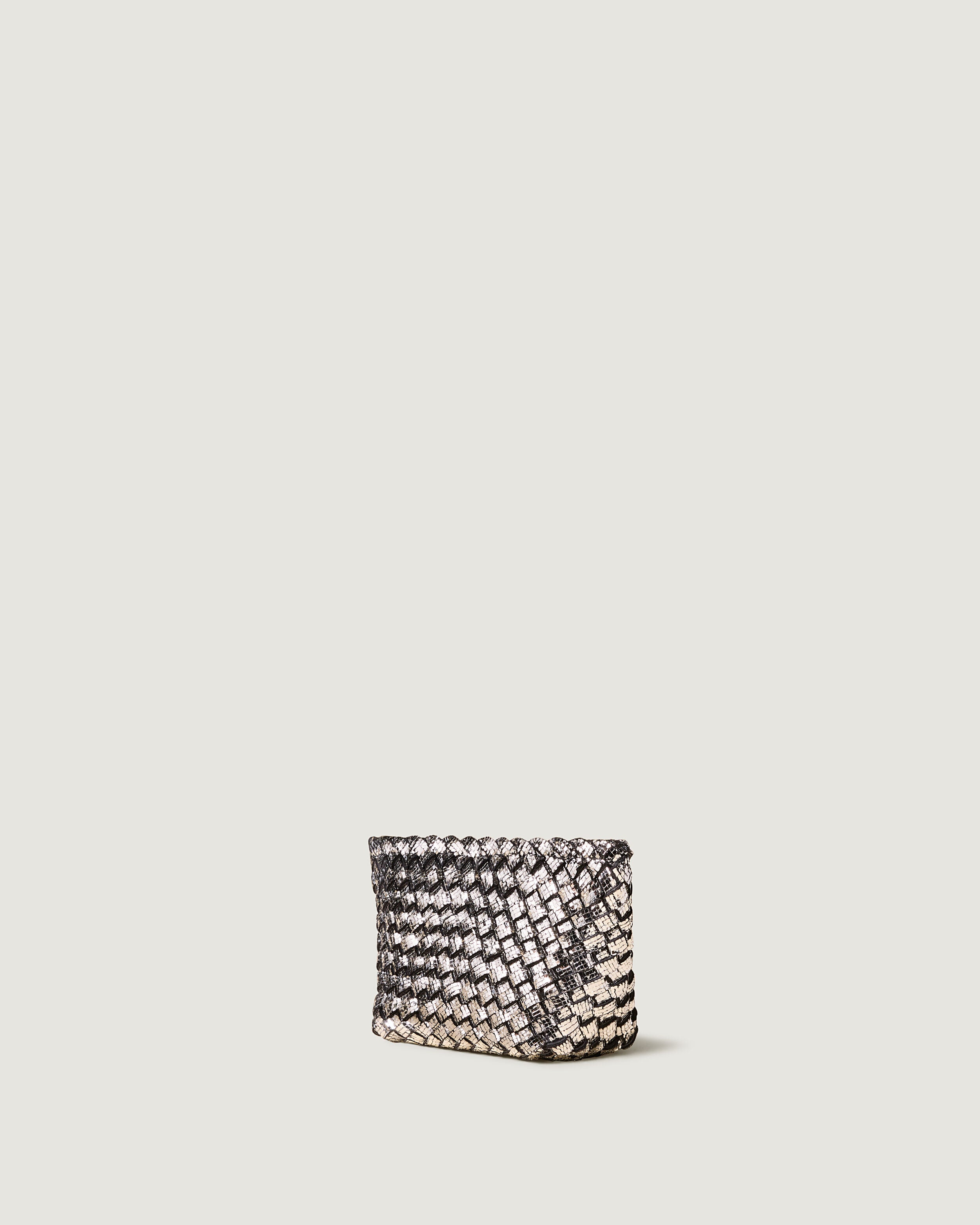 Portofino Cosmetic Pouch in Silver shown from a side angle, highlighting its  and zip closure.