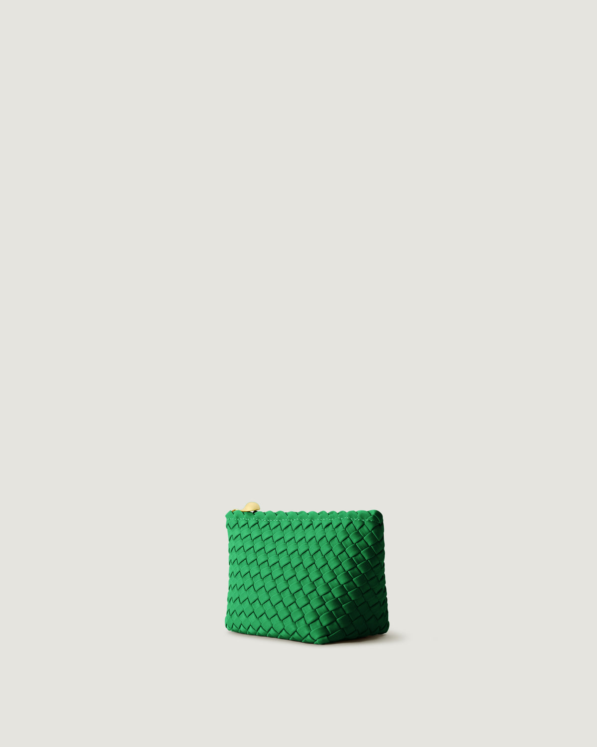 Portofino Cosmetic Pouch in Emerald shown from a side angle, highlighting its handwoven neoprene construction and zip closure.