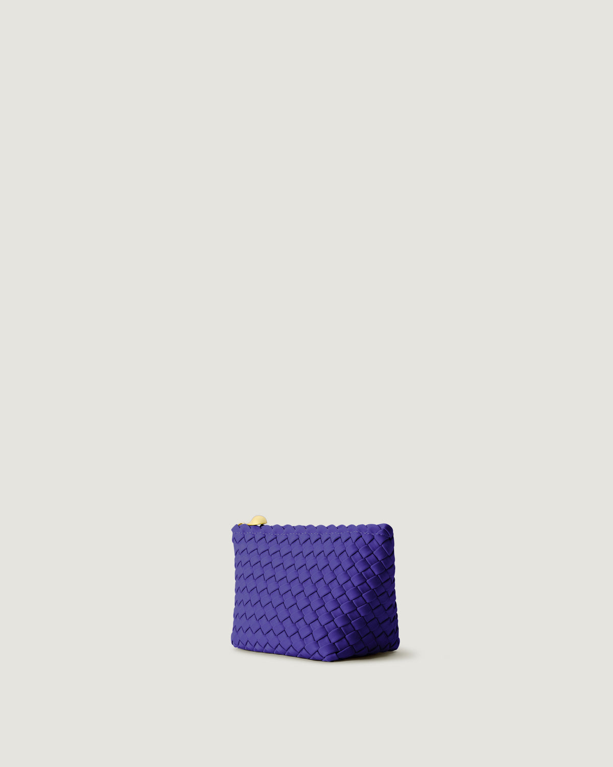 Portofino Cosmetic Pouch in Ultramarine shown from a side angle, highlighting its handwoven neoprene construction and zip closure.